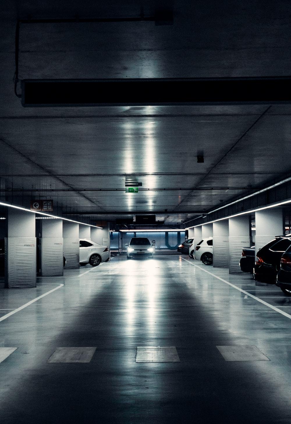 An Empty Parking Garage At A Night Time Background, Parking Garage Near Me  To Take Picture, Car, Garage Background Image And Wallpaper for Free  Download