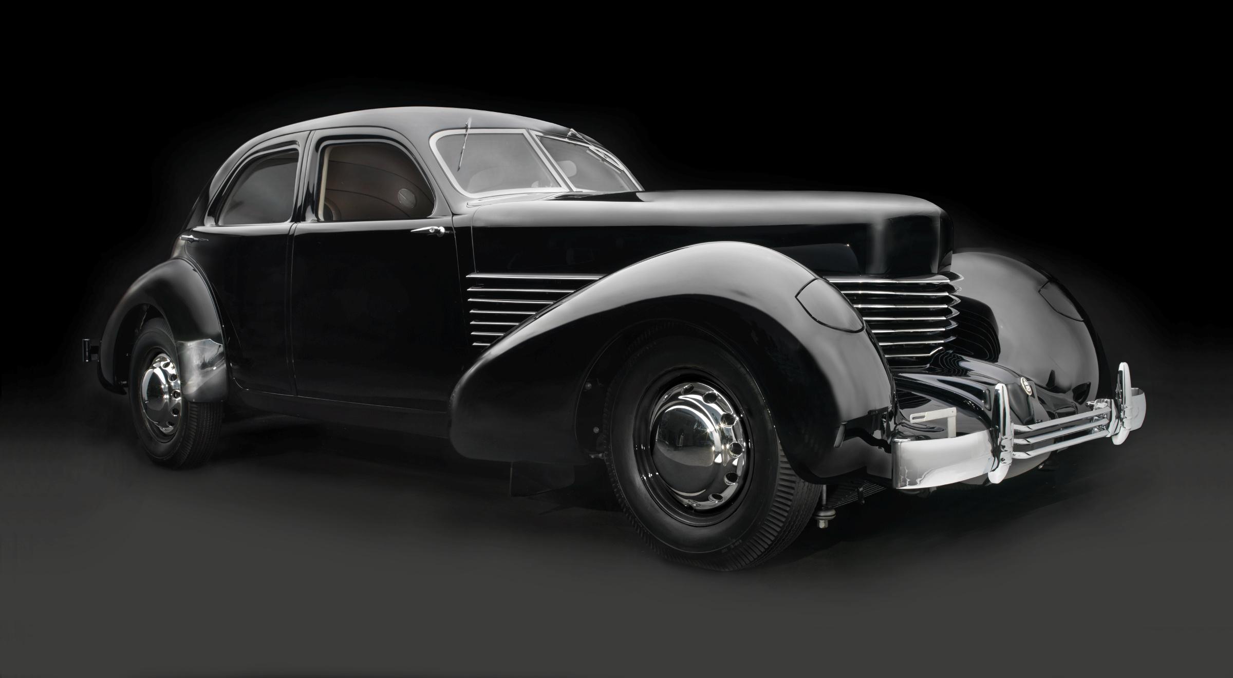 2400x1320 Sculpted in Steel: Artful construction of automobiles