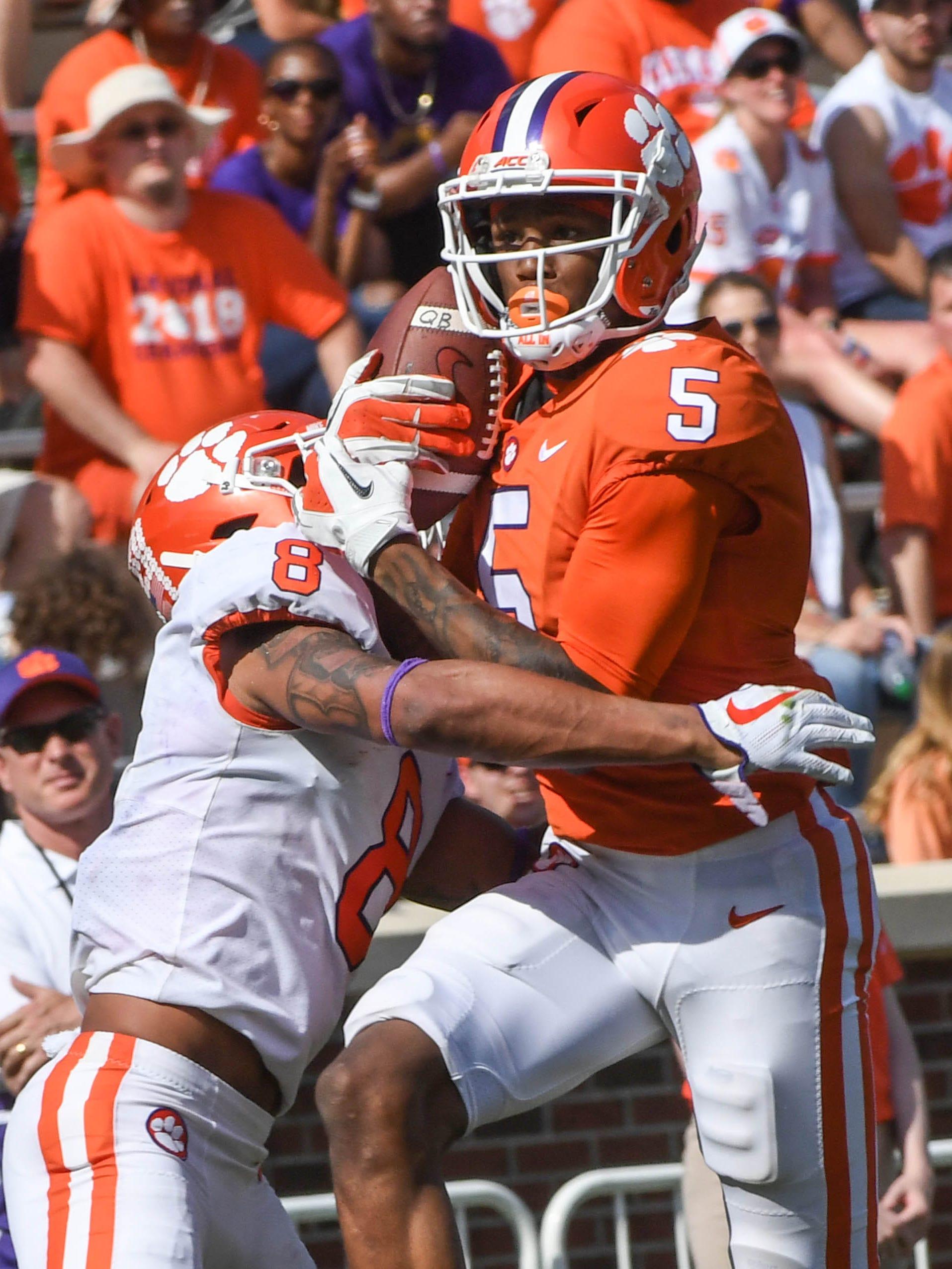 1915x2553 Photo of Clemson's Tee Higgins posing with sports car creates frenzy