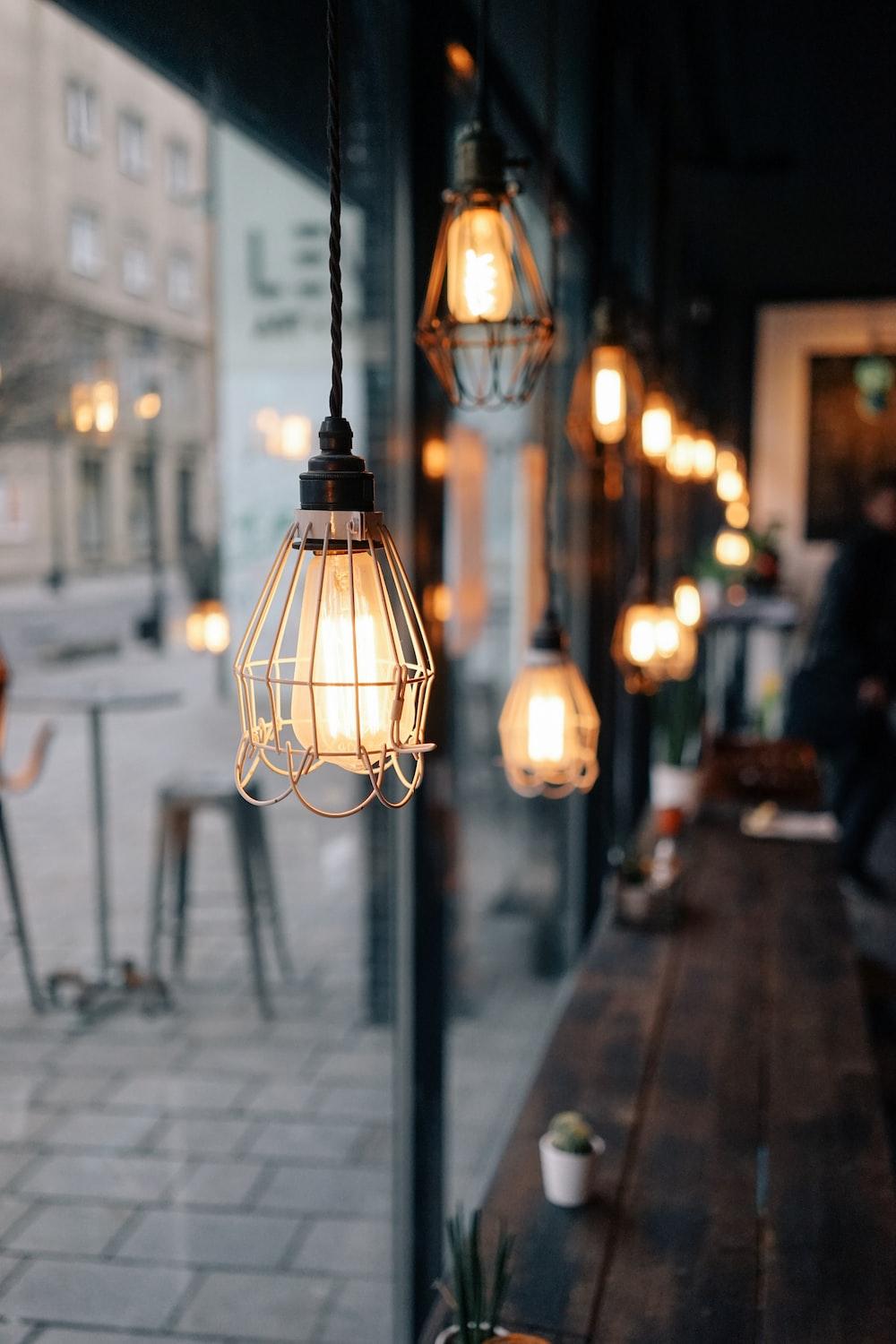 1000x1500 shallow focus photography of store pendant lamps photo