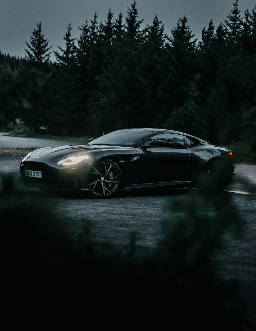 1000x1294 silver porsche 911 on road photo