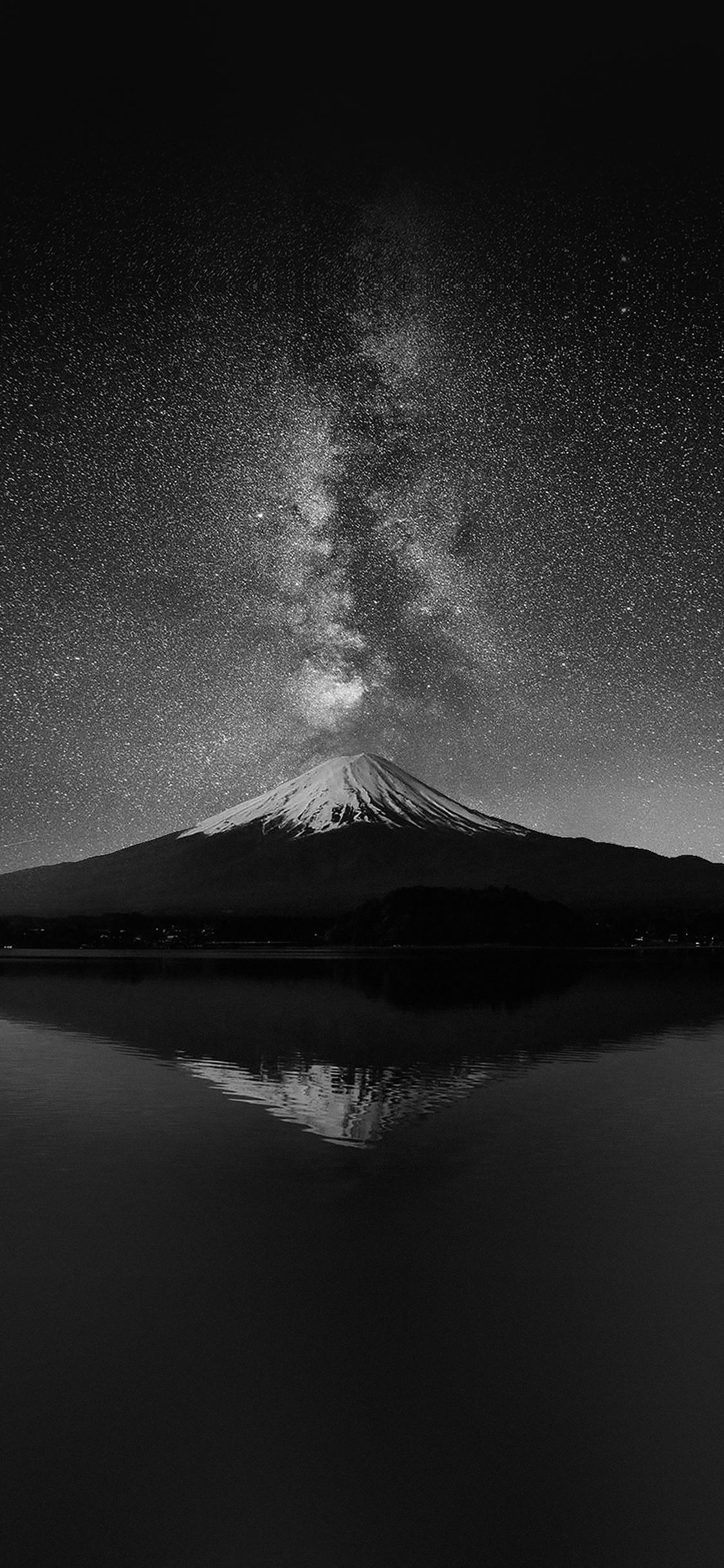 1125x2436 iPhoneXpapers milky way on black mountain fuji sky