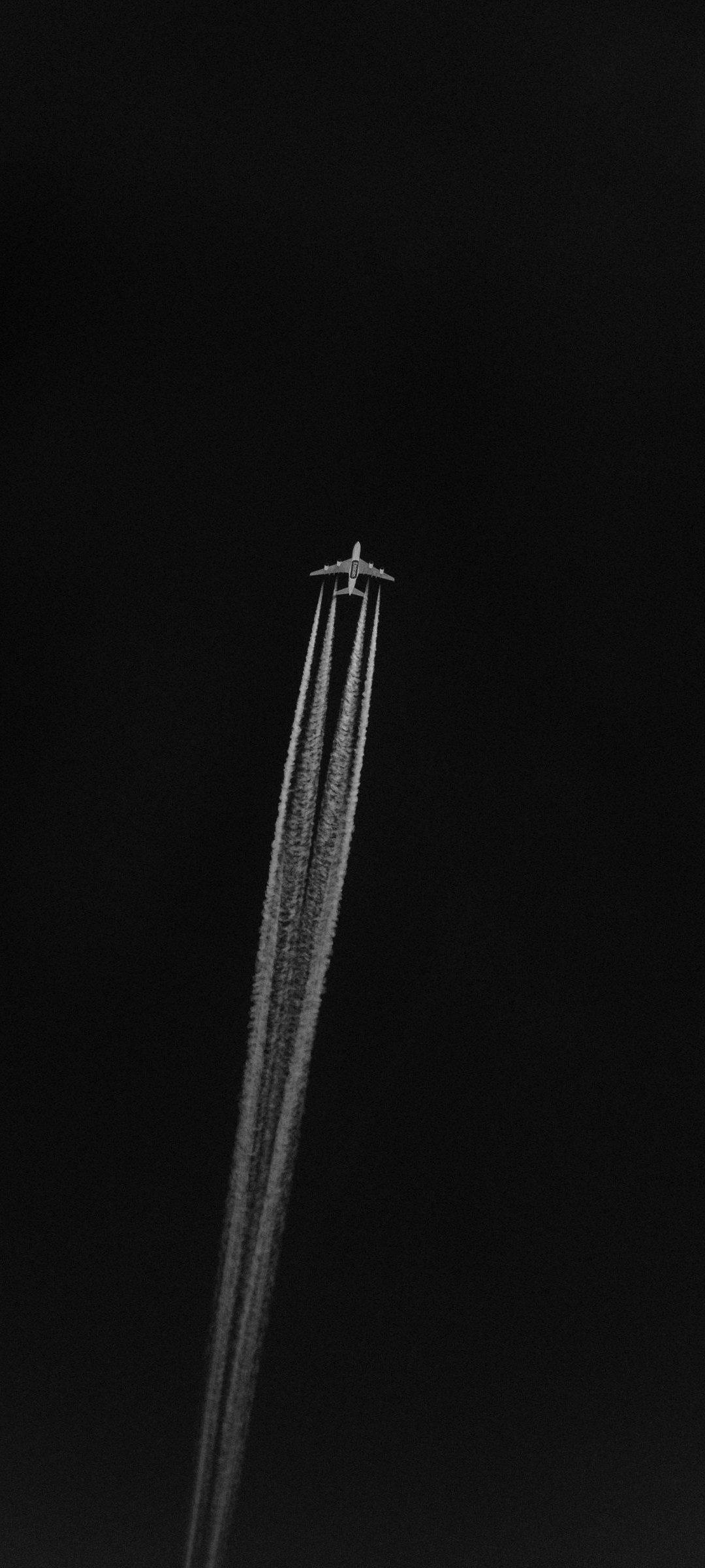 1080x2400 Minimalist Amoled Black Plane Wallpaper