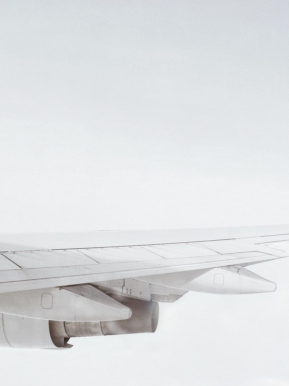 1000x1333 airplane with white smoke photo