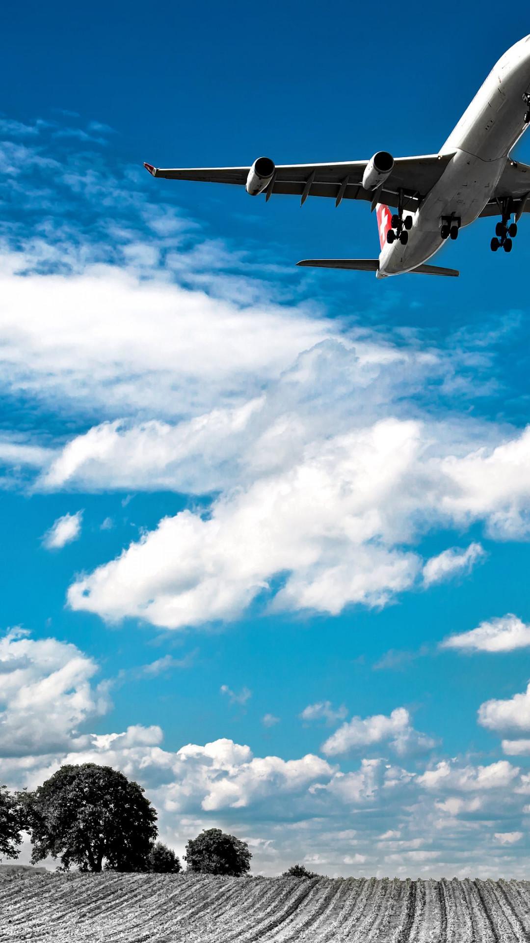1080x1920 Download wallpaper: Swiss airplane landing in Zurich 1080x1920