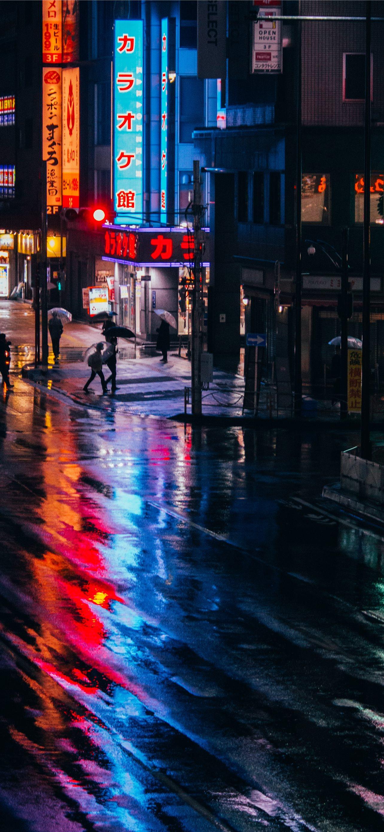 1284x2778 people walking on street during night time iPhone Wallpaper Free Download