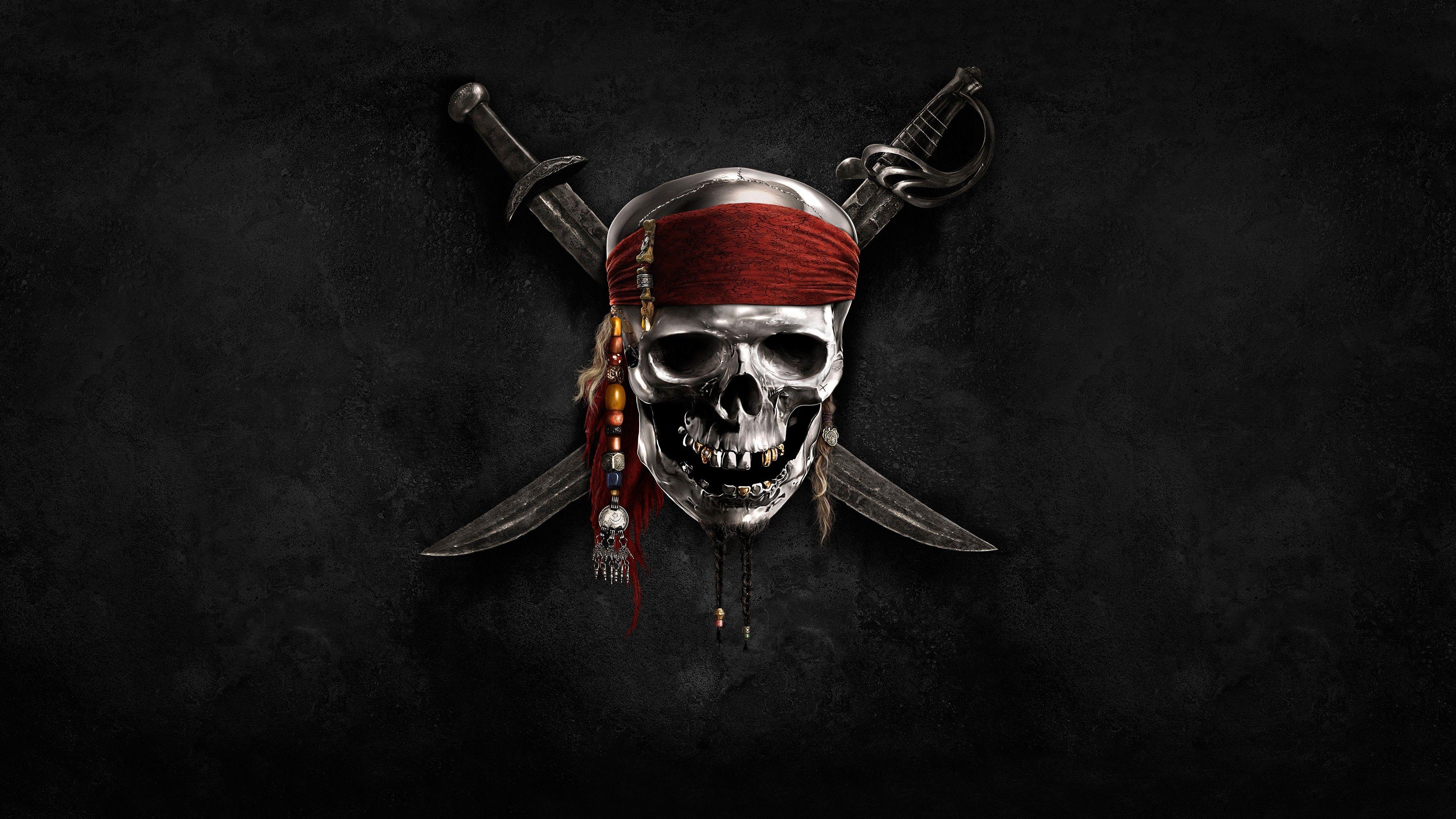 magic kingdom disney pirates of the caribbean logo