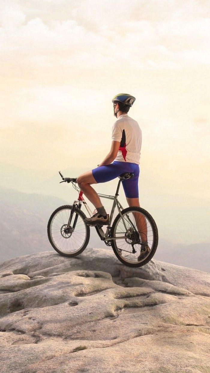 700x1245 Bike Rider Top Mountain IPhone 6 Wallpaper