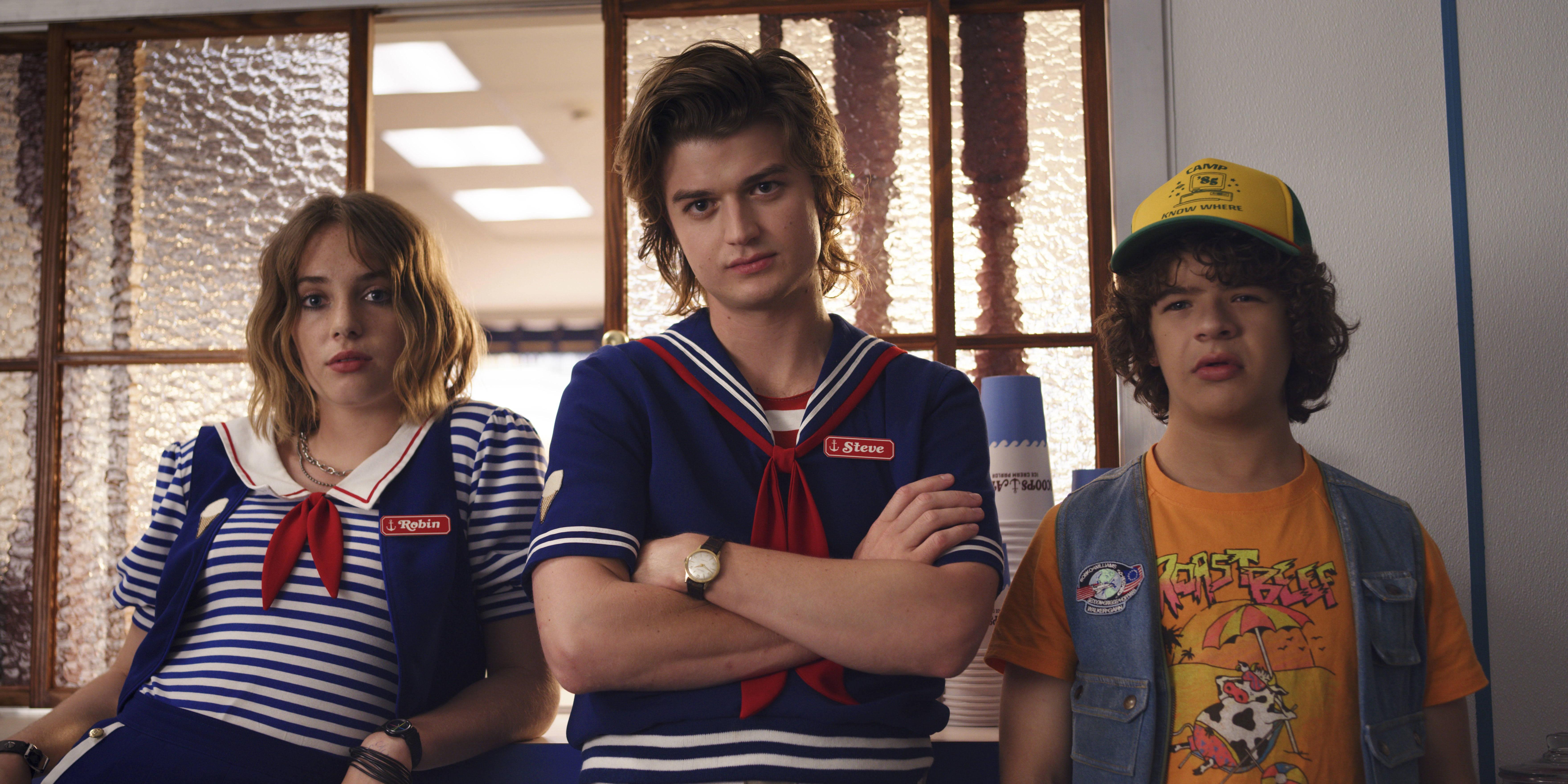 7040x3520 Download Stranger Things Cast Robin, Steve, And Dustin Wallpaper