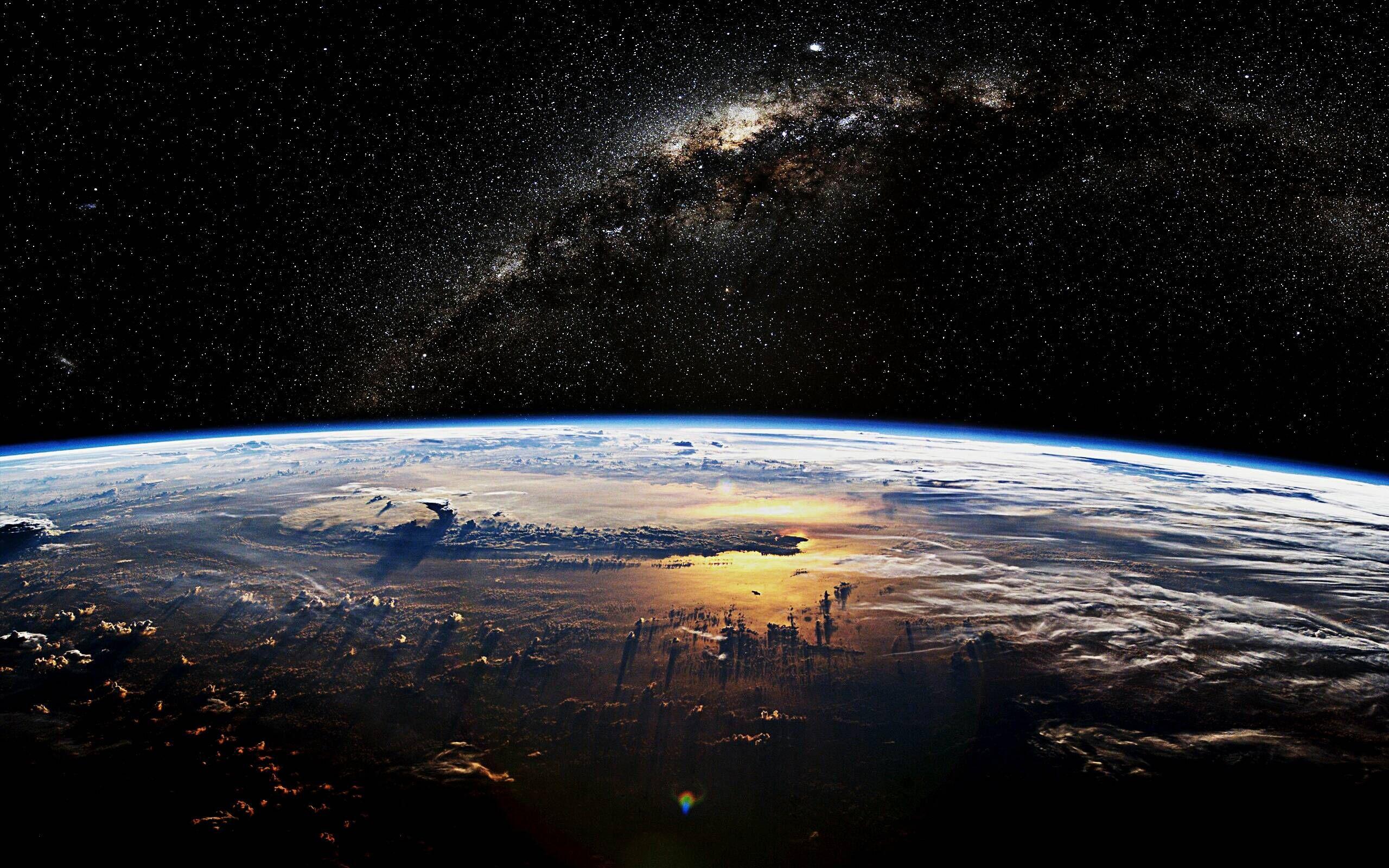 2560x1600 Earth In Space Wallpaper