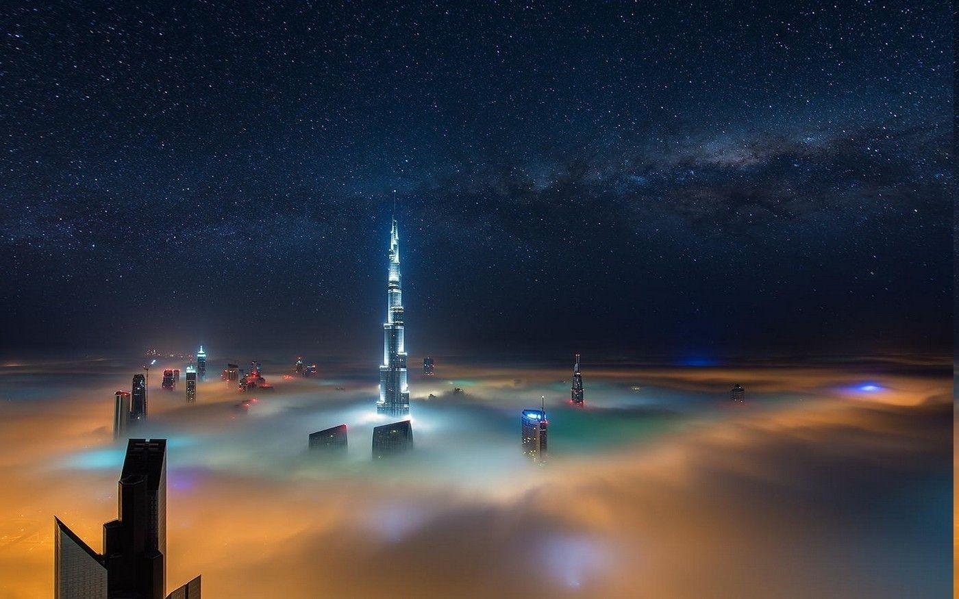 1400x875 cityscape long exposure milky way mist skyscraper dubai starry night