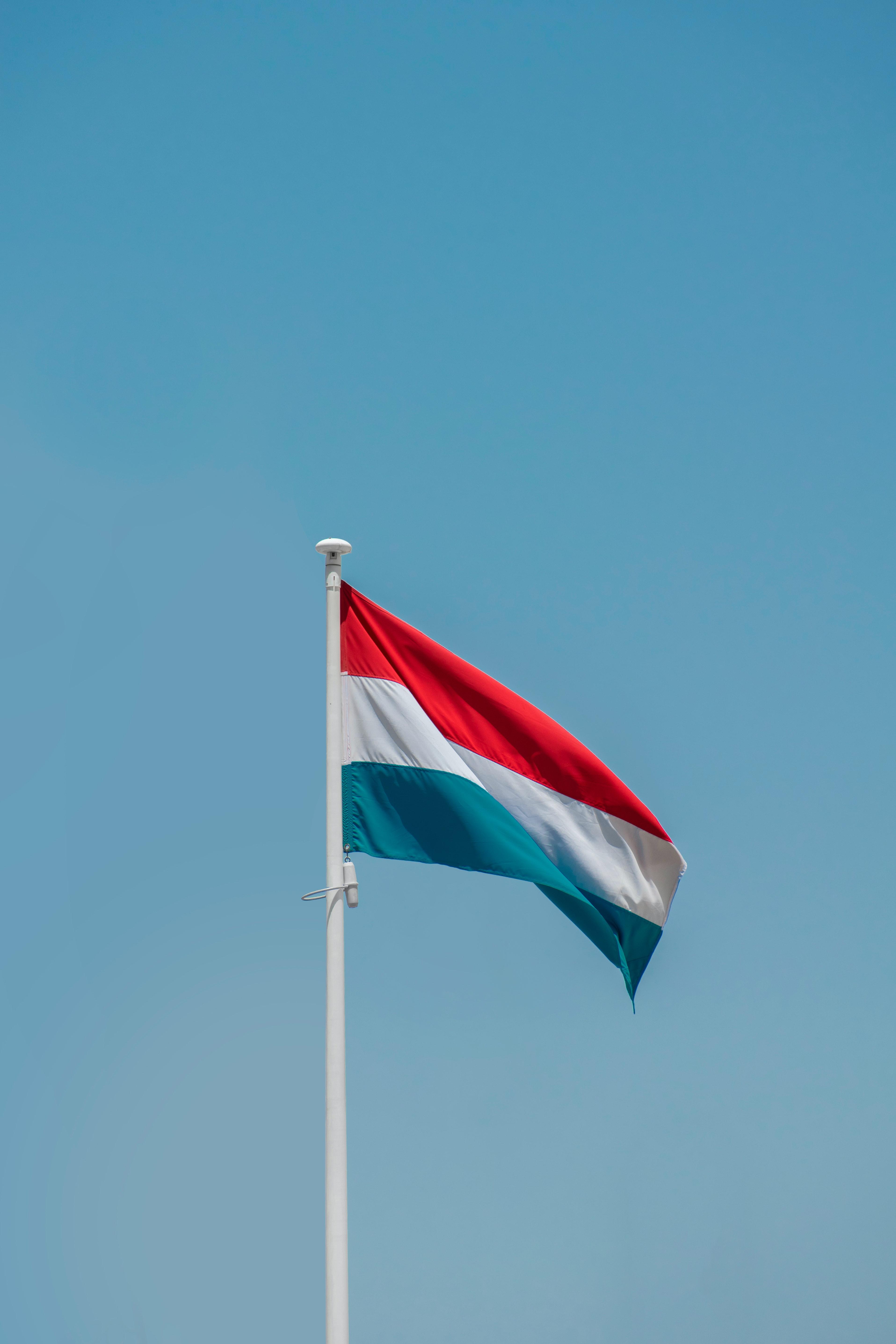 3831x5747 Flag of Luxembourg on a Flagpole · Free
