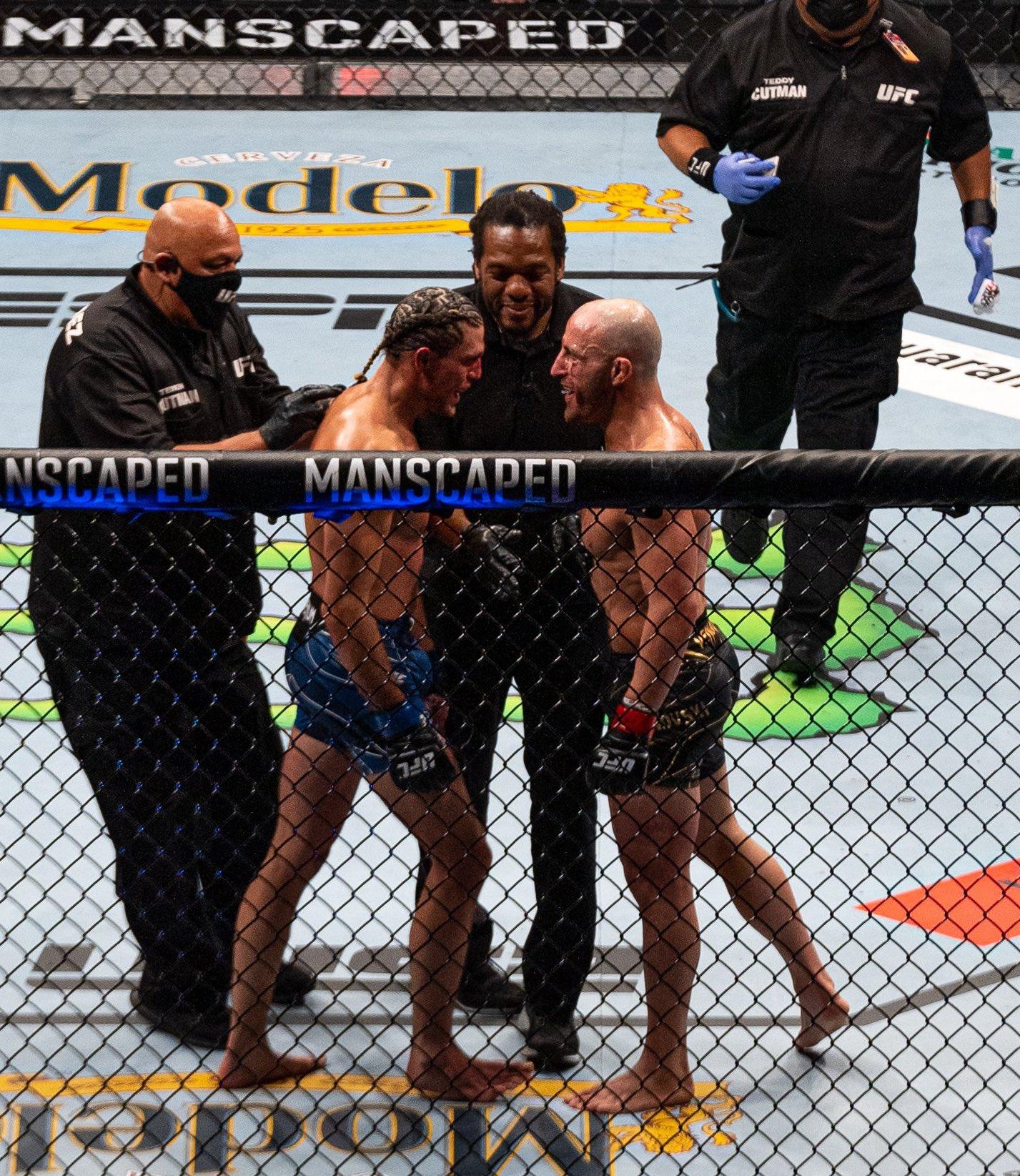 1427x1645 Fight Pics That Go Hard Volkanovski and Brian Ortega between rounds at UFC 266