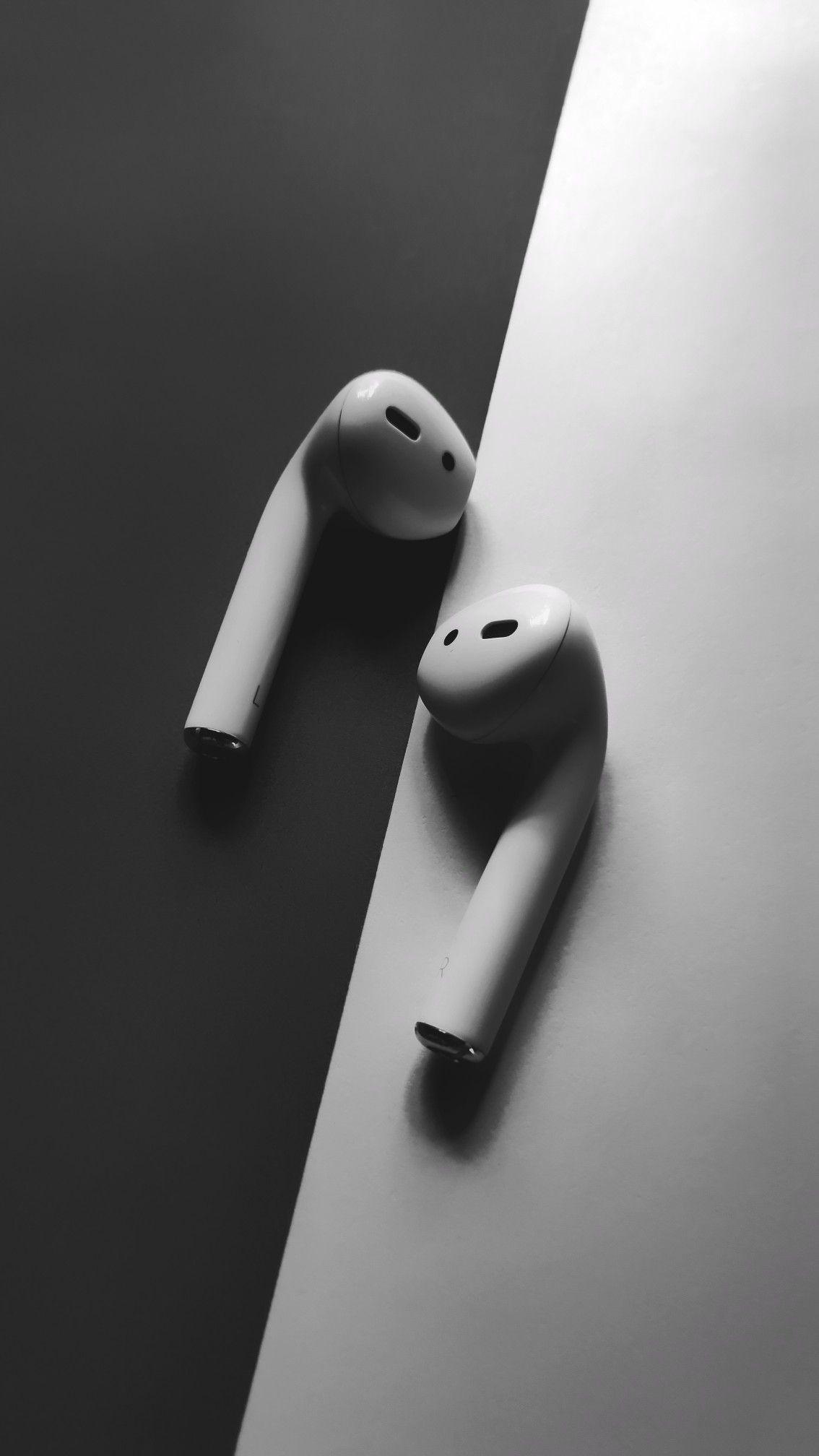 1134x2016 White Apple airpods, headphones Wallpaper in black and white background. Wallpaper photo. Black and white background, iPhone wallpaper music, Apple wallpaper