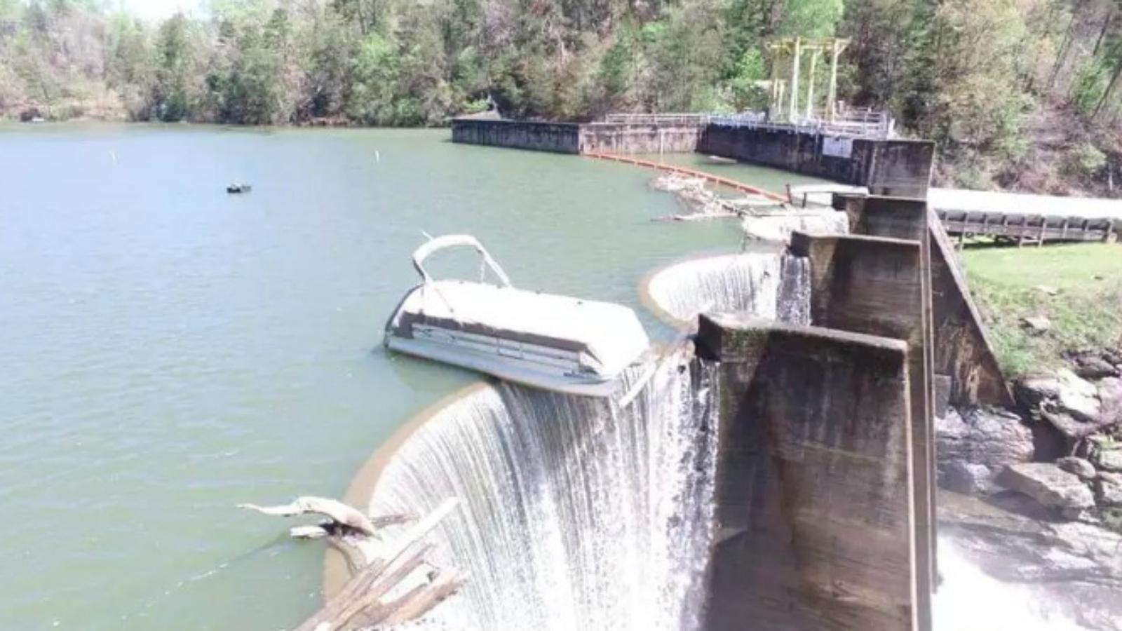 1600x900 Photos: Pontoon boat dangles off side of North Carolina dam