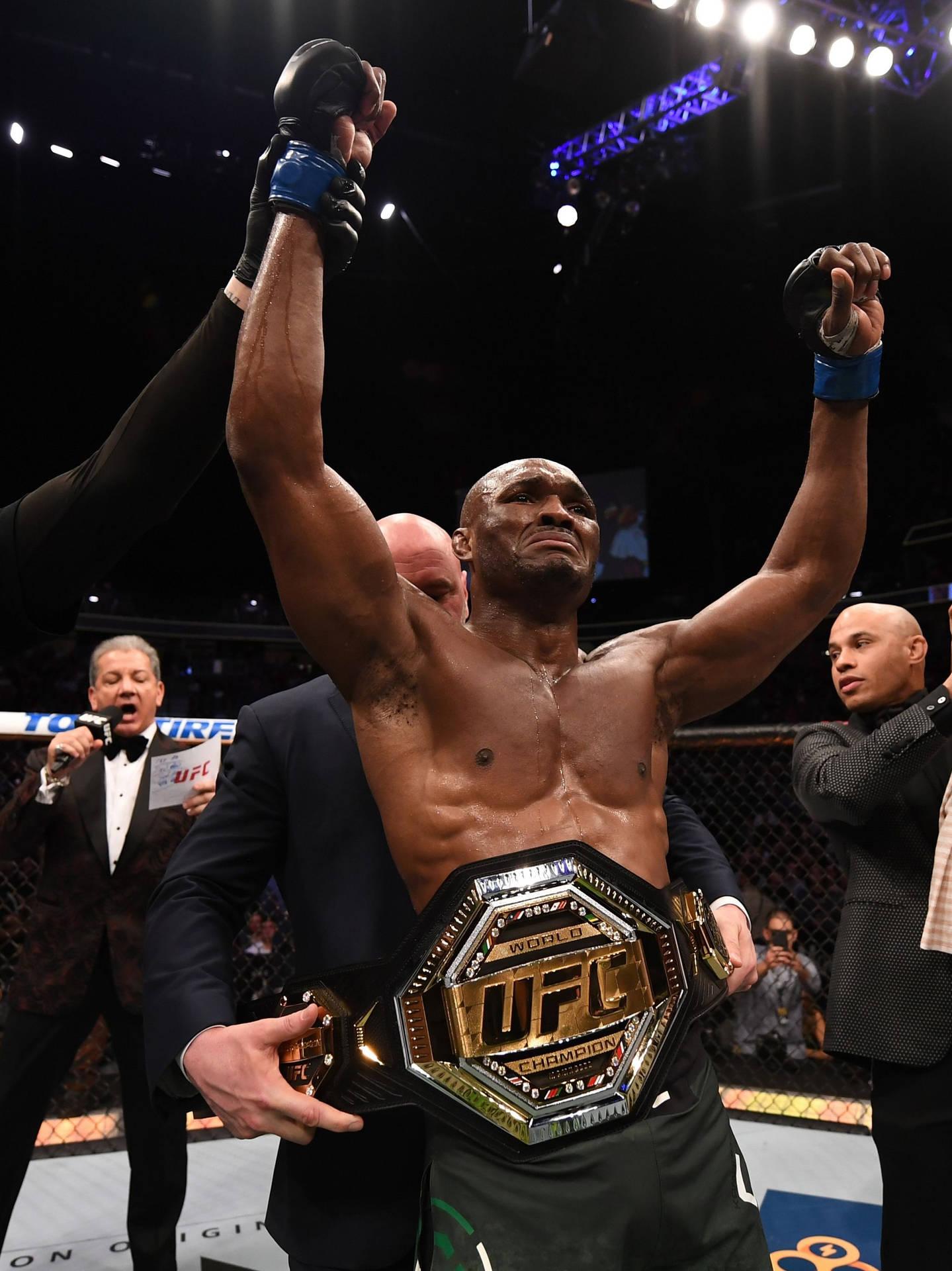 1439x1920 Download Kamaru Usman Champion Belt Wallpaper