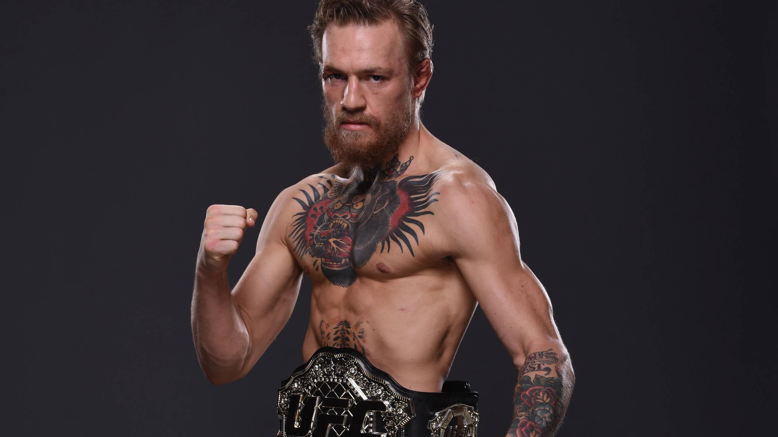 2560x1440 Download Conor Mcgregor With Ufc Belt Wallpaper