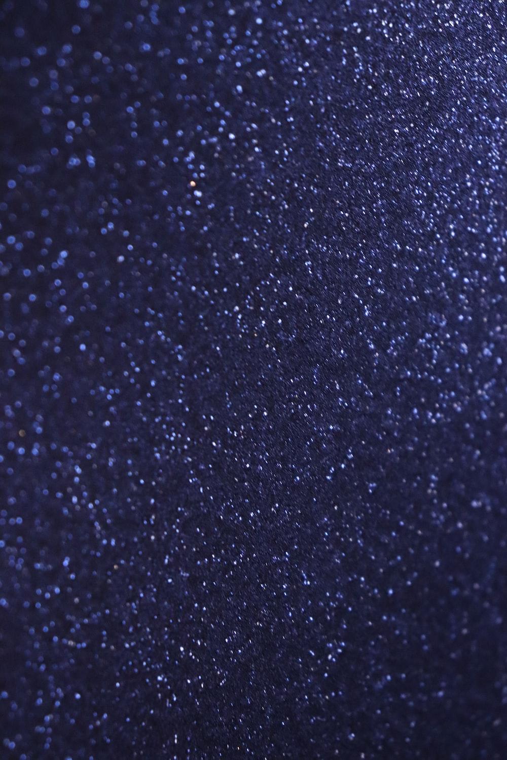Free Vector  Realistic navy blue glitter background