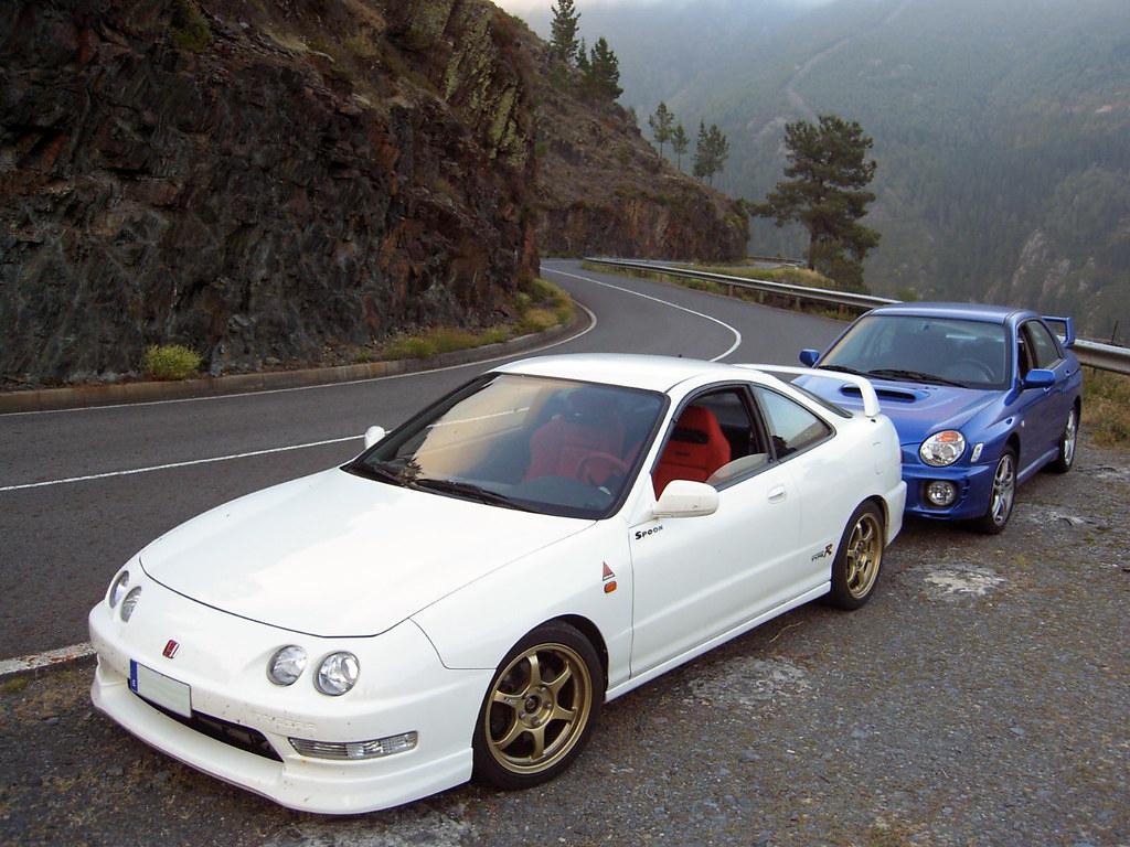 1024x768 Touge no Oni. De fondo. un bonito parque de atracciones