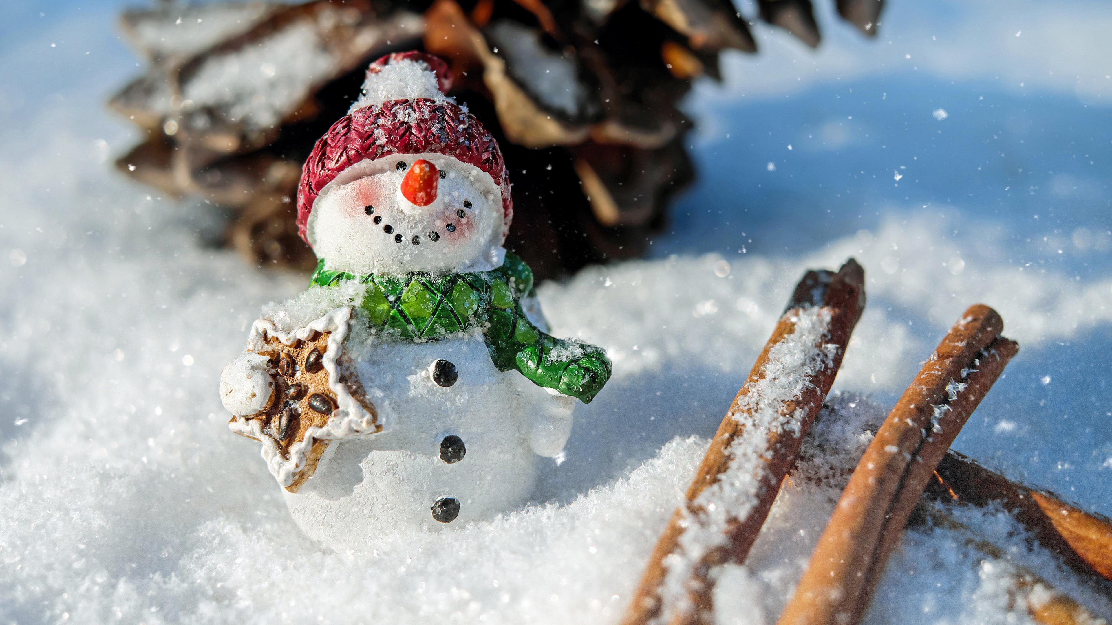3840x2160 Wallpaper 4k snowman, snow, cinnamon, pine cone, christmas, new year 4k Wallpaper
