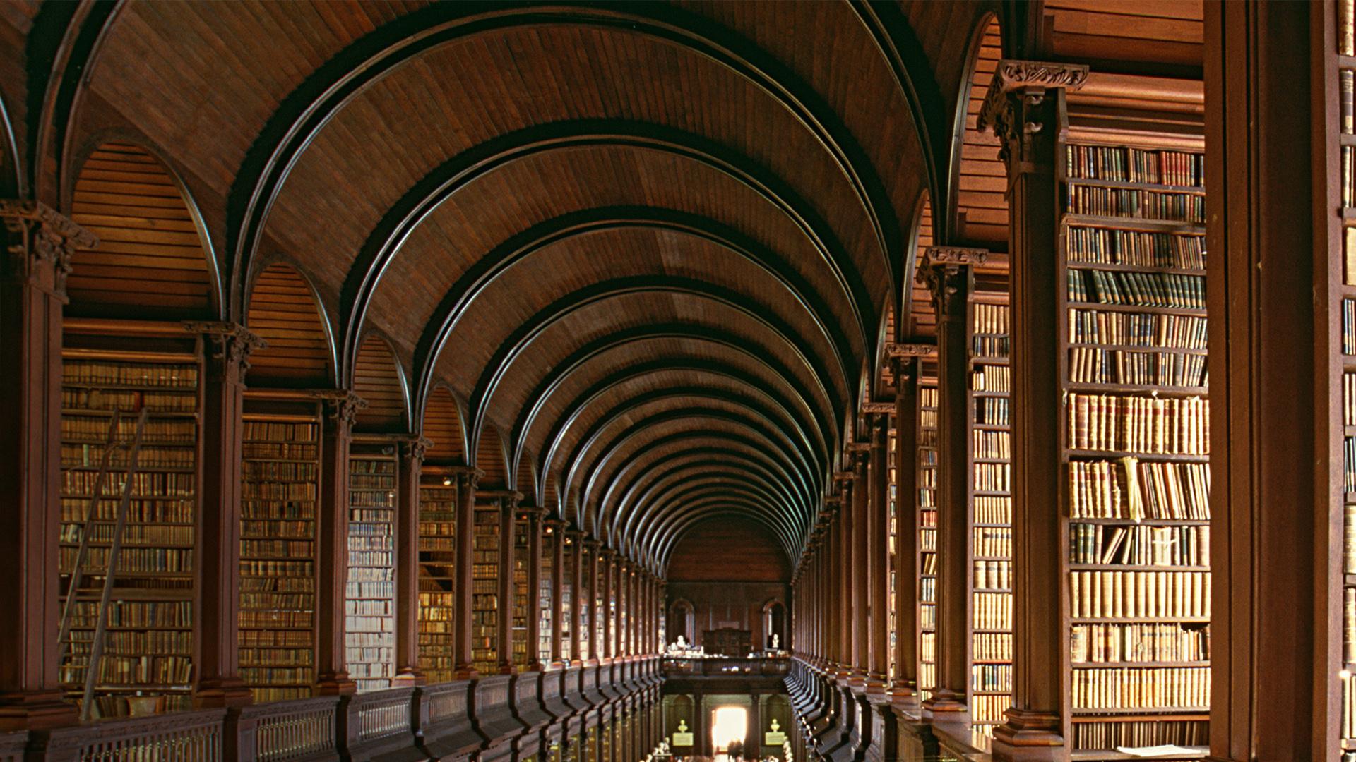 1920x1080 Old library, wisdom in old shelves and books, Trinity College Library, Dublin, Ireland. Windows 10 Spotlight Image