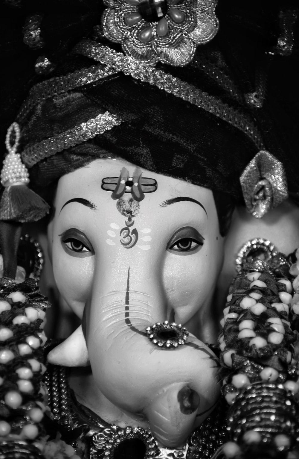 1000x1533 white and black hindu deity figurine photo