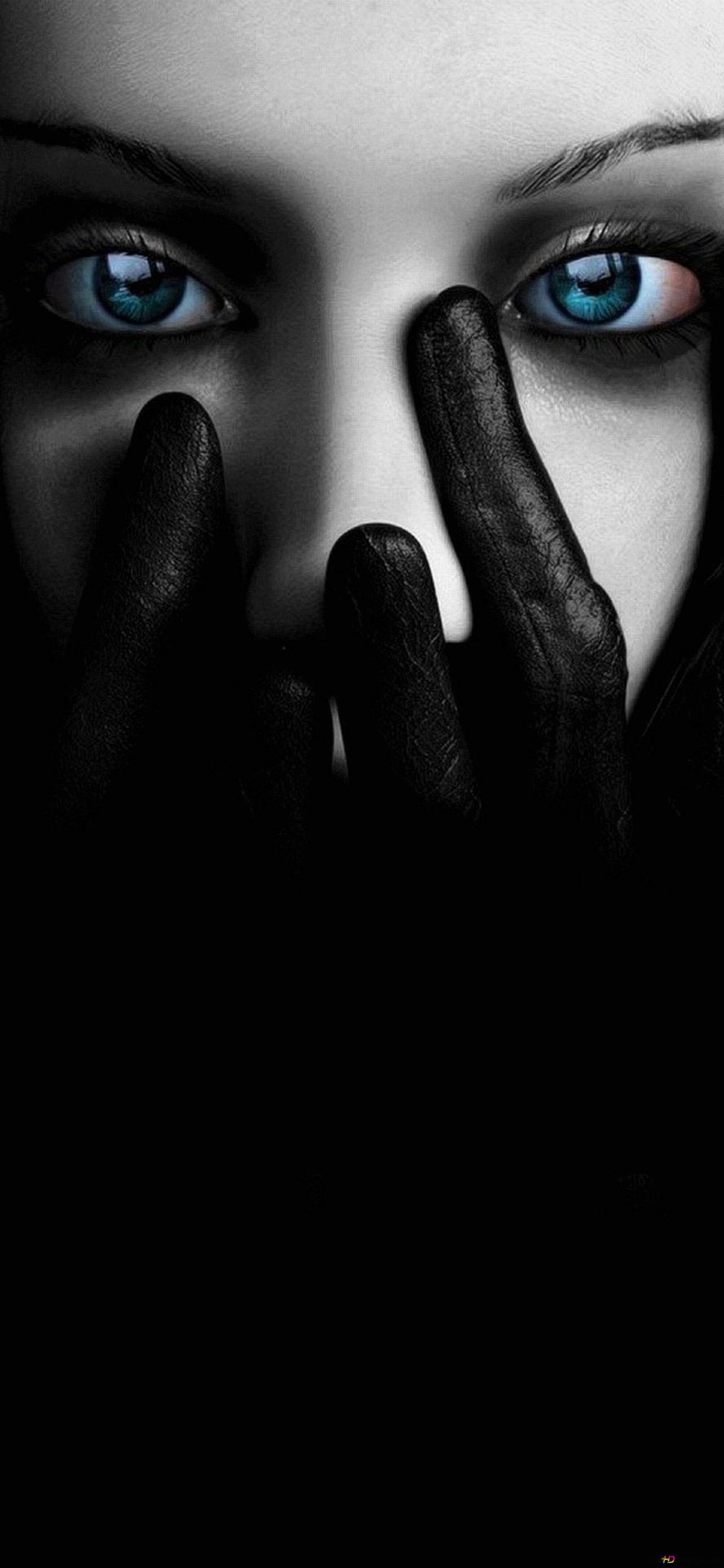 1284x2778 Black and white photo of woman in black gloves with blue eyes 2K wallpaper download