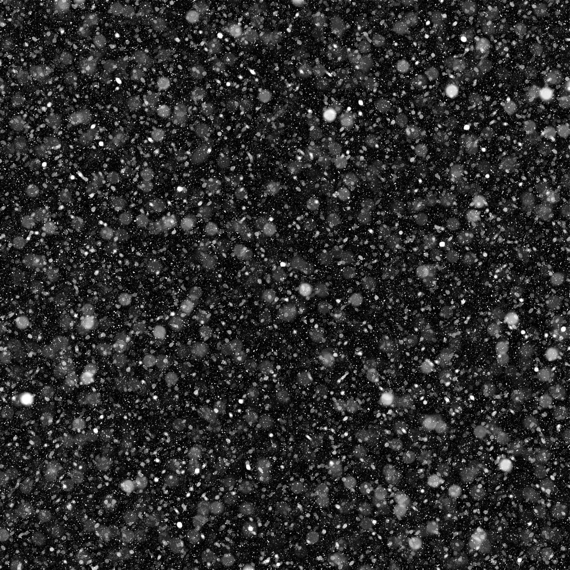 2000x2000 Premium Photo. Isolated natural white snow texture effect on black night background