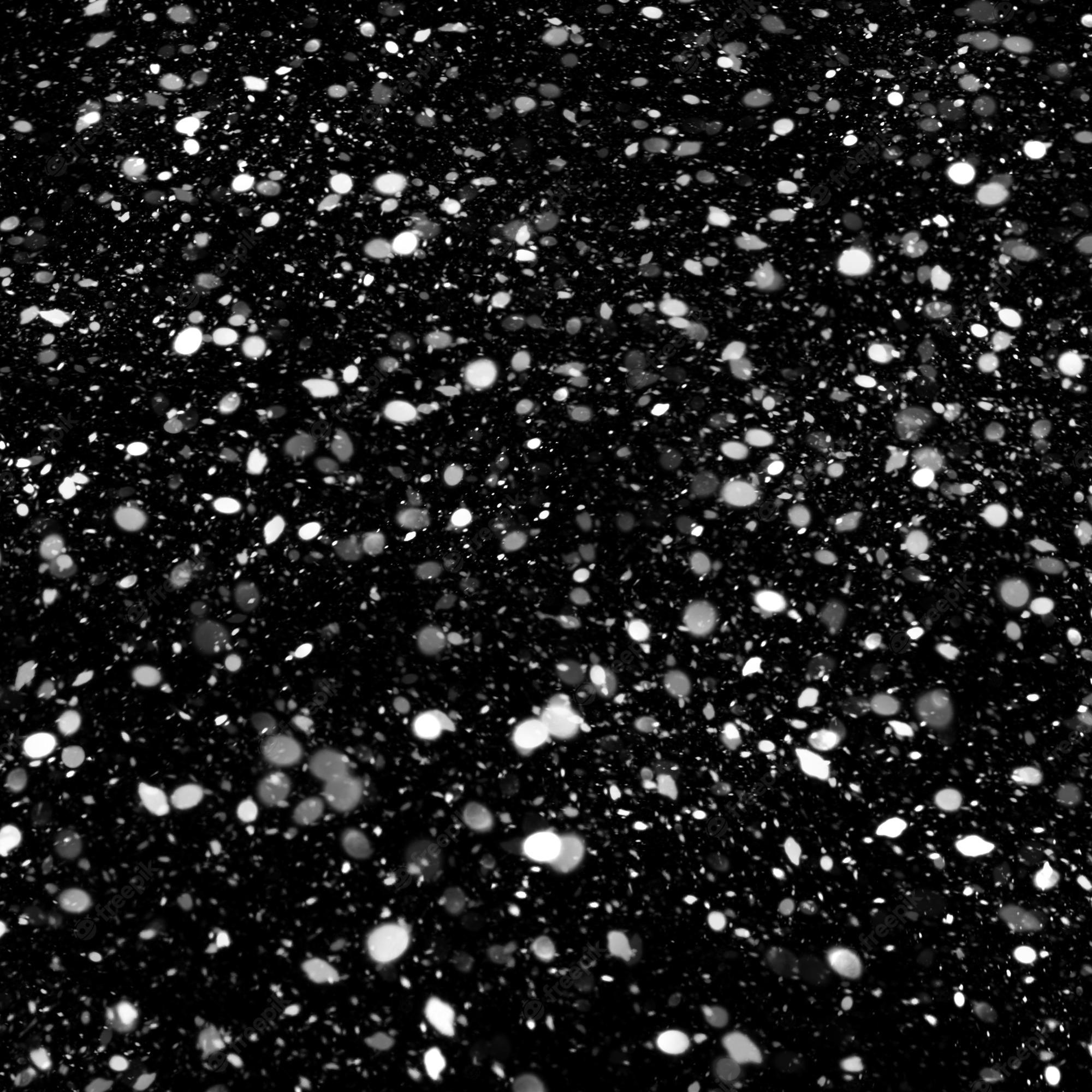 2000x2000 Premium Photo. Isolated natural white snow texture effect on black night background