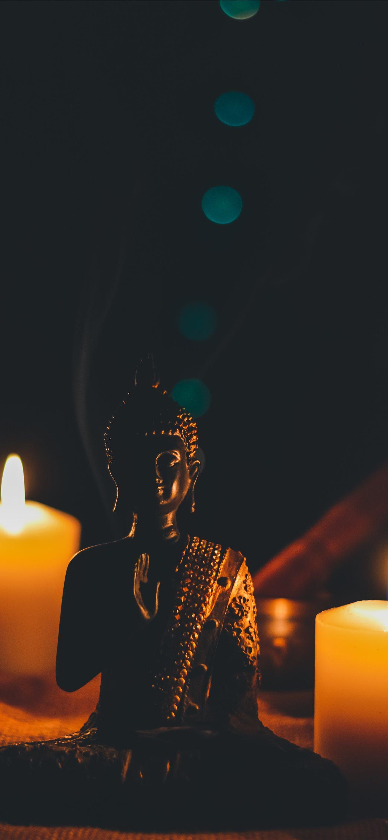 1284x2778 buddha figurine candles buddhism harmony HD backgr. iPhone Wallpaper Free Download