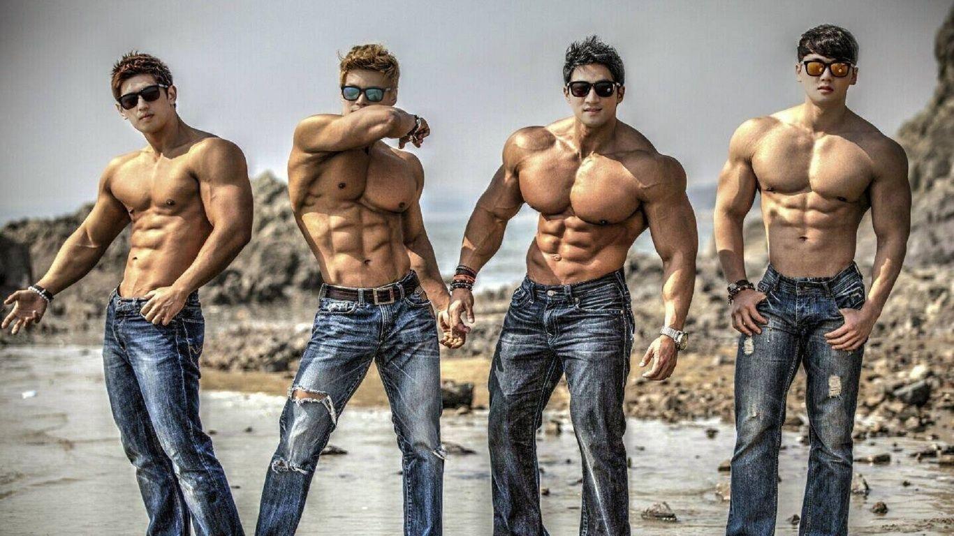 1366x768 Muscle Men Wallpaper