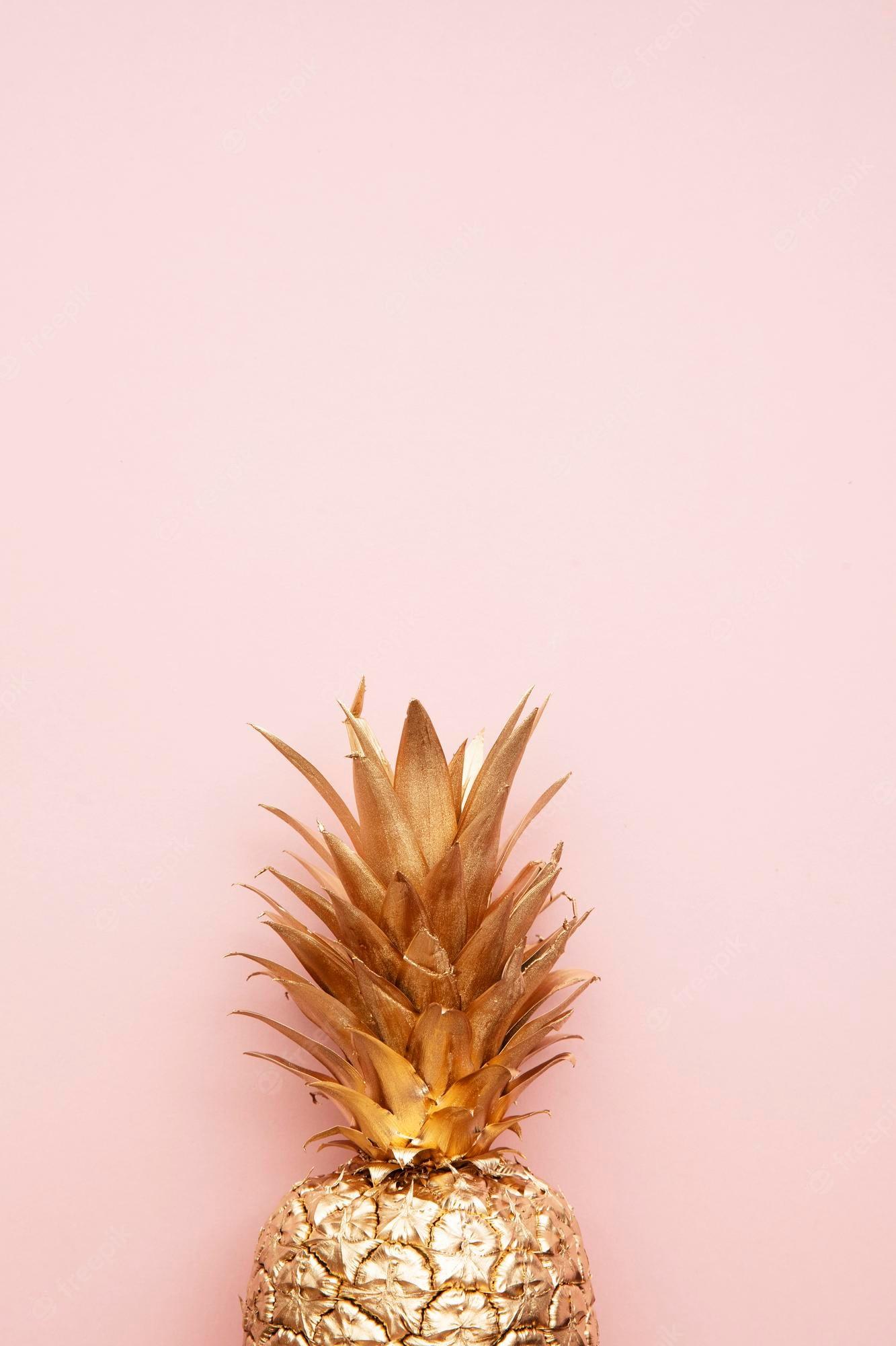 1333x2000 Premium Photo. Gold tropical pineapple on a pastel pink background flat lay summer background