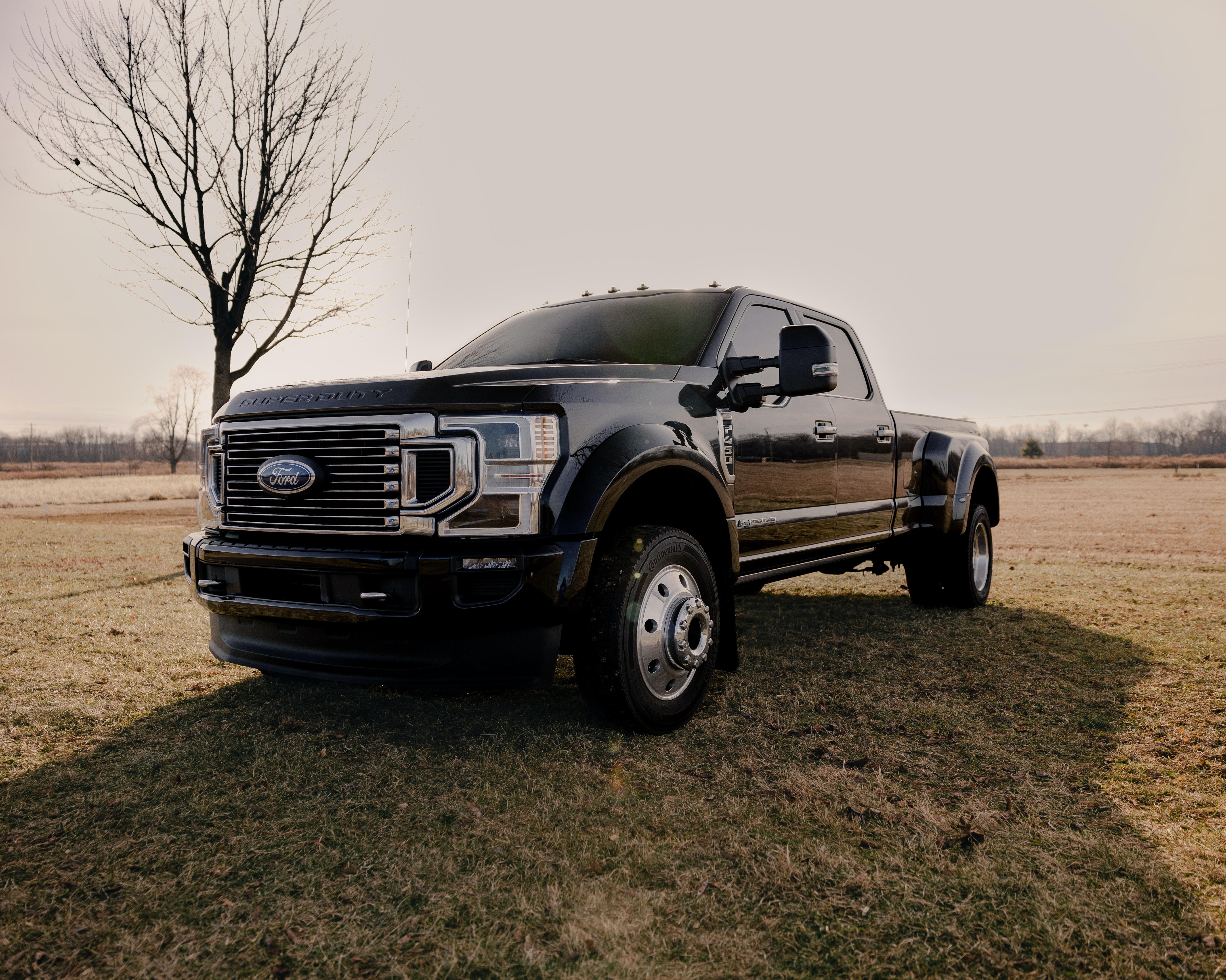 5488x4390 White Ford F 150 Crew Cab Pickup Truck on Grass Field · Free