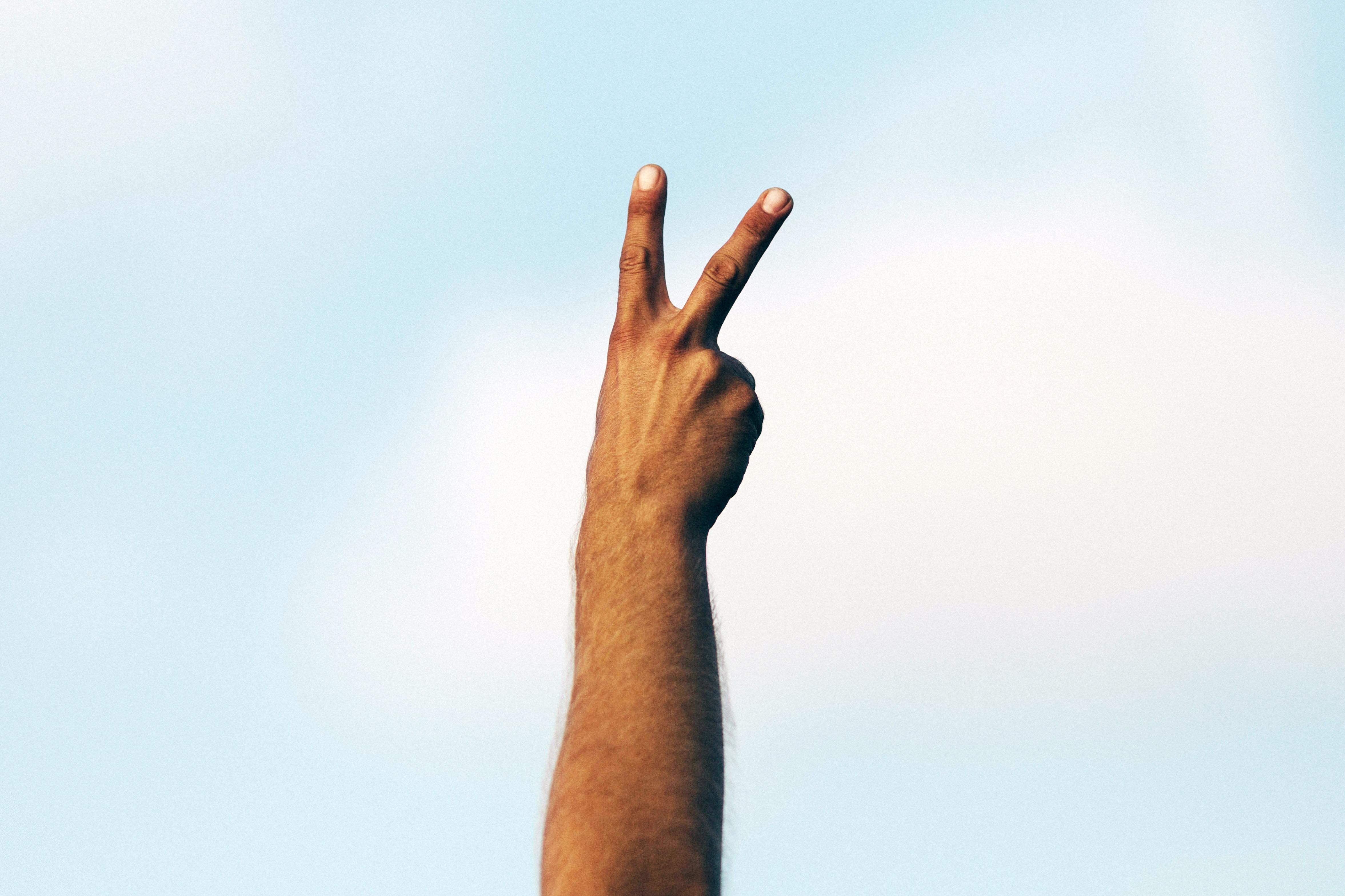 4707x3138 4707x3138 victory, blue, sky, person, finger, PNG image, hand, hand up, blue sky, arm, peace sign, peace Gallery HD Wallpaper