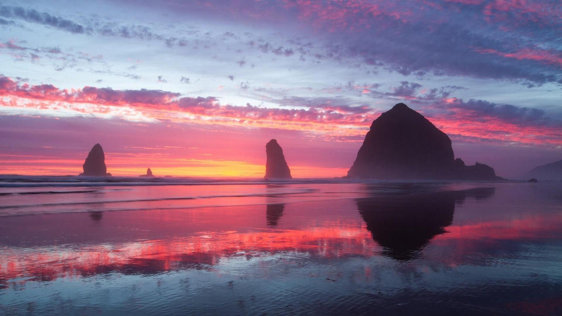1920x1080 Beaches: Sea Rocks Sunset Pink Reflection Reflections Beach