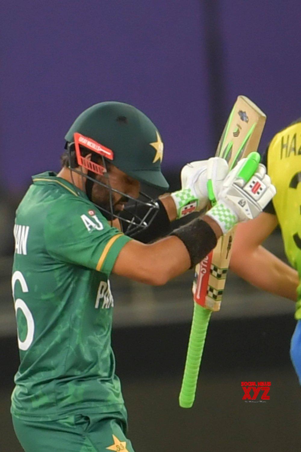 1000x1500 Dubai:Pakistan's Mohammad Rizwan celebrates after scoring a half century during the Cricket Twenty20 World Cup semi match between Pakistan and Australia in Dubai. #Gallery News XYZ