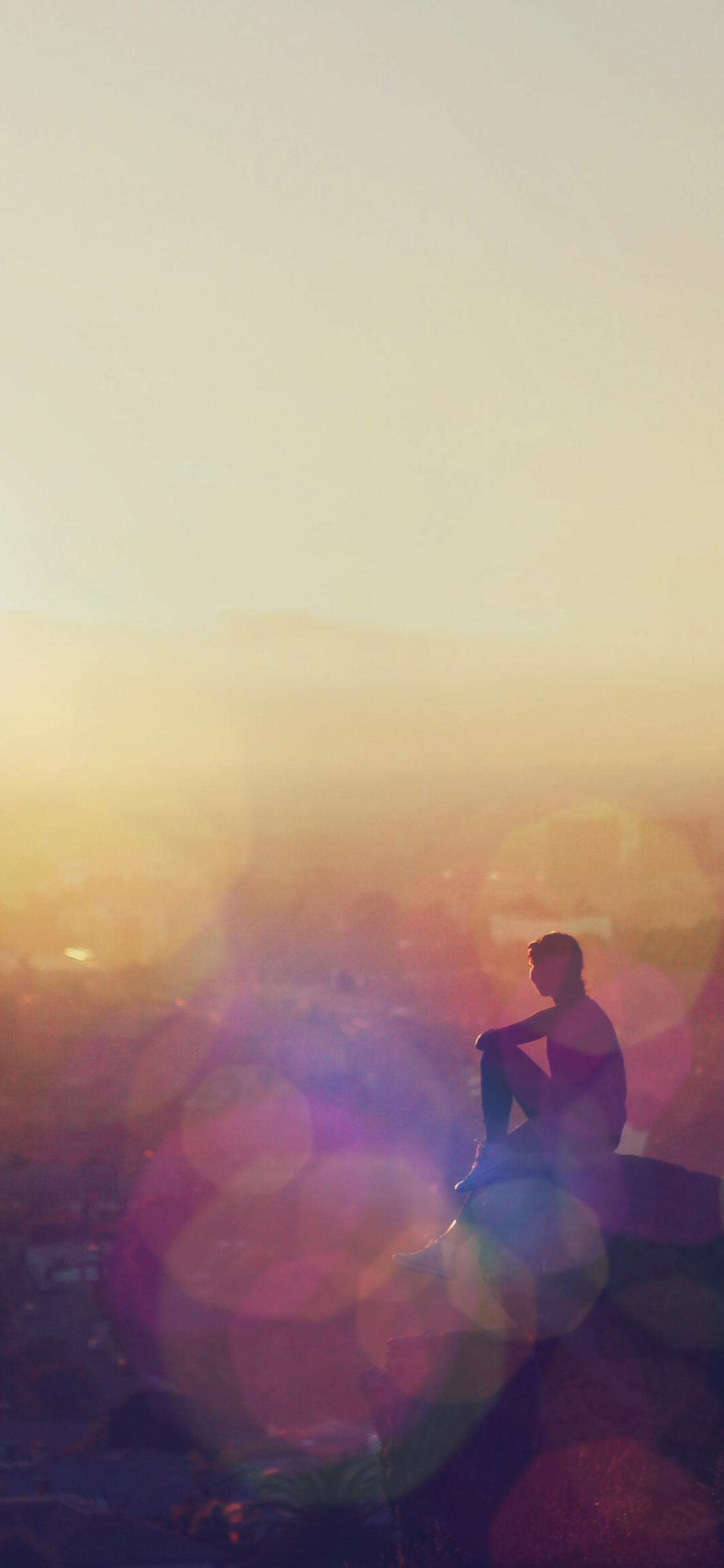 1125x2436 iPhone X wallpaper. morning mountain girl alone after running flare