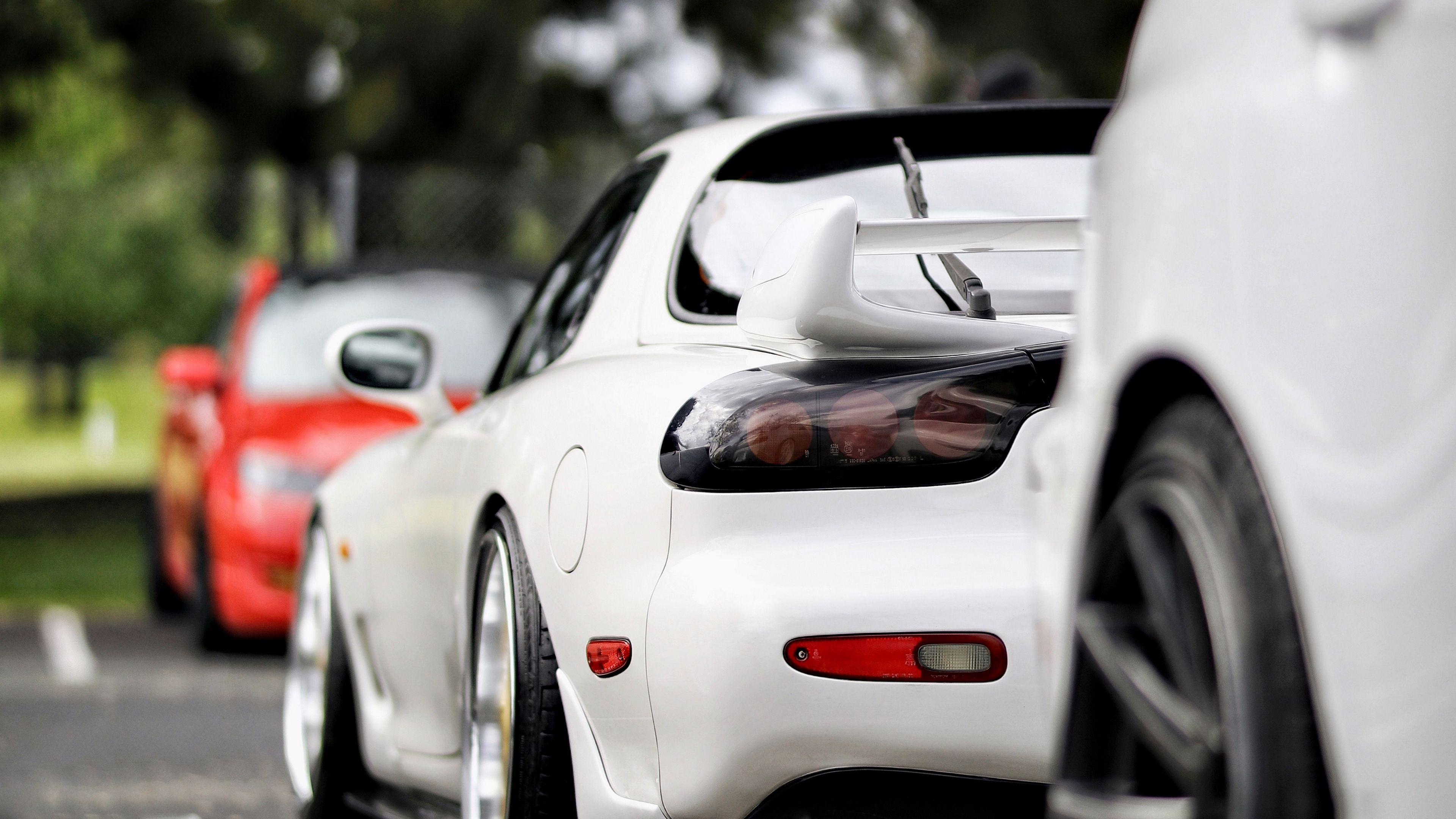 3840x2160 Download wallpaper 3840x2160 mazda rx- mazda, car, sports car, white, rear view, motion blur 4k uhd 16:9 HD background