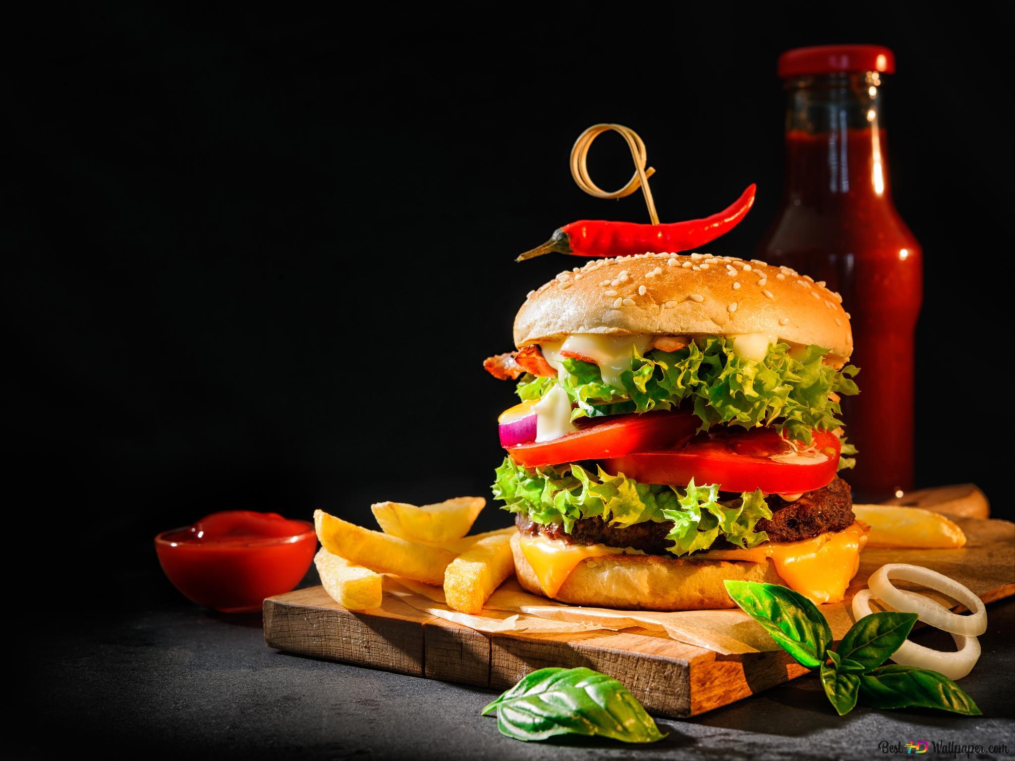 2048x1536 Overloaded burger with fries and a bottle of ketchup 4K wallpaper download