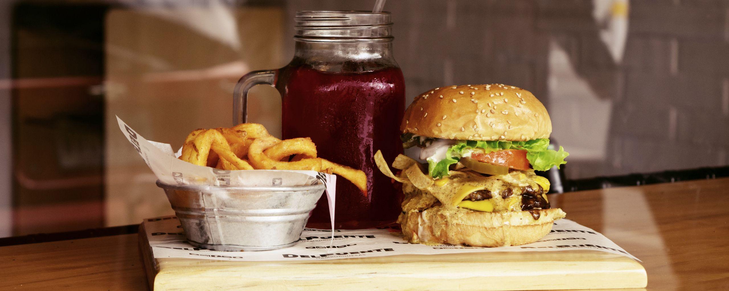 2560x1024 Download wallpaper 2560x1024 burger, hamburger, french fries, fast food, drink ultrawide monitor HD background