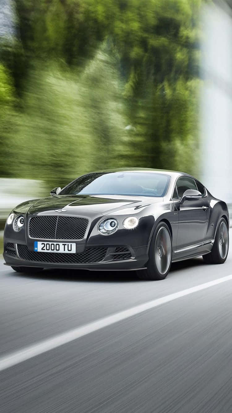 750x1334 Download Accelerating Black Bentley iPhone Wallpaper