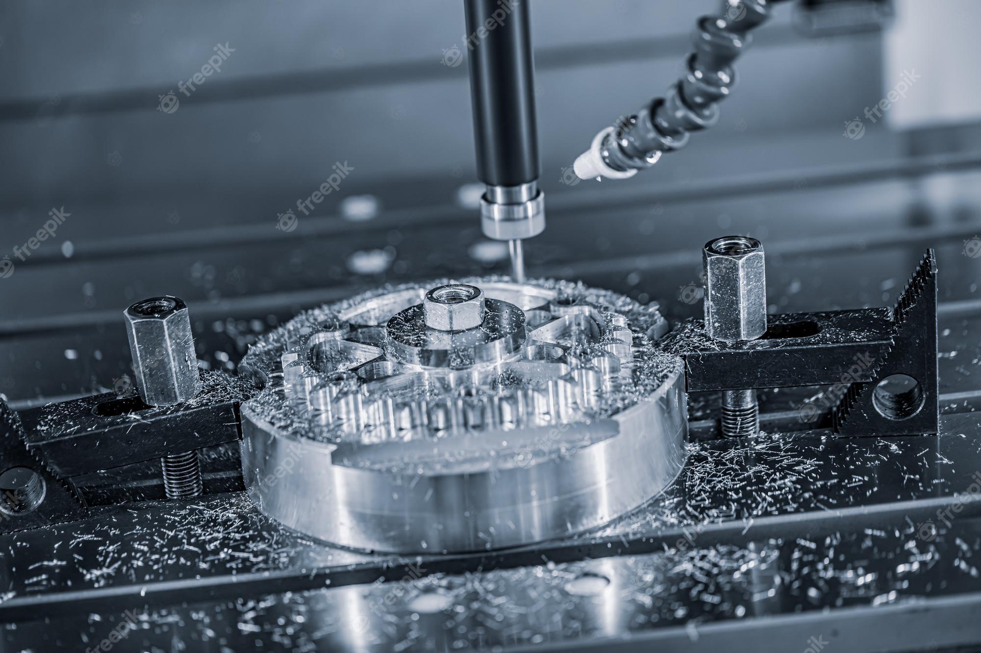 2000x1333 Premium Photo. Metalworking cnc lathe milling machine. cutting metal modern processing technology. milling is the process of machining using rotary cutters to remove material by advancing a cutter into a workpiece