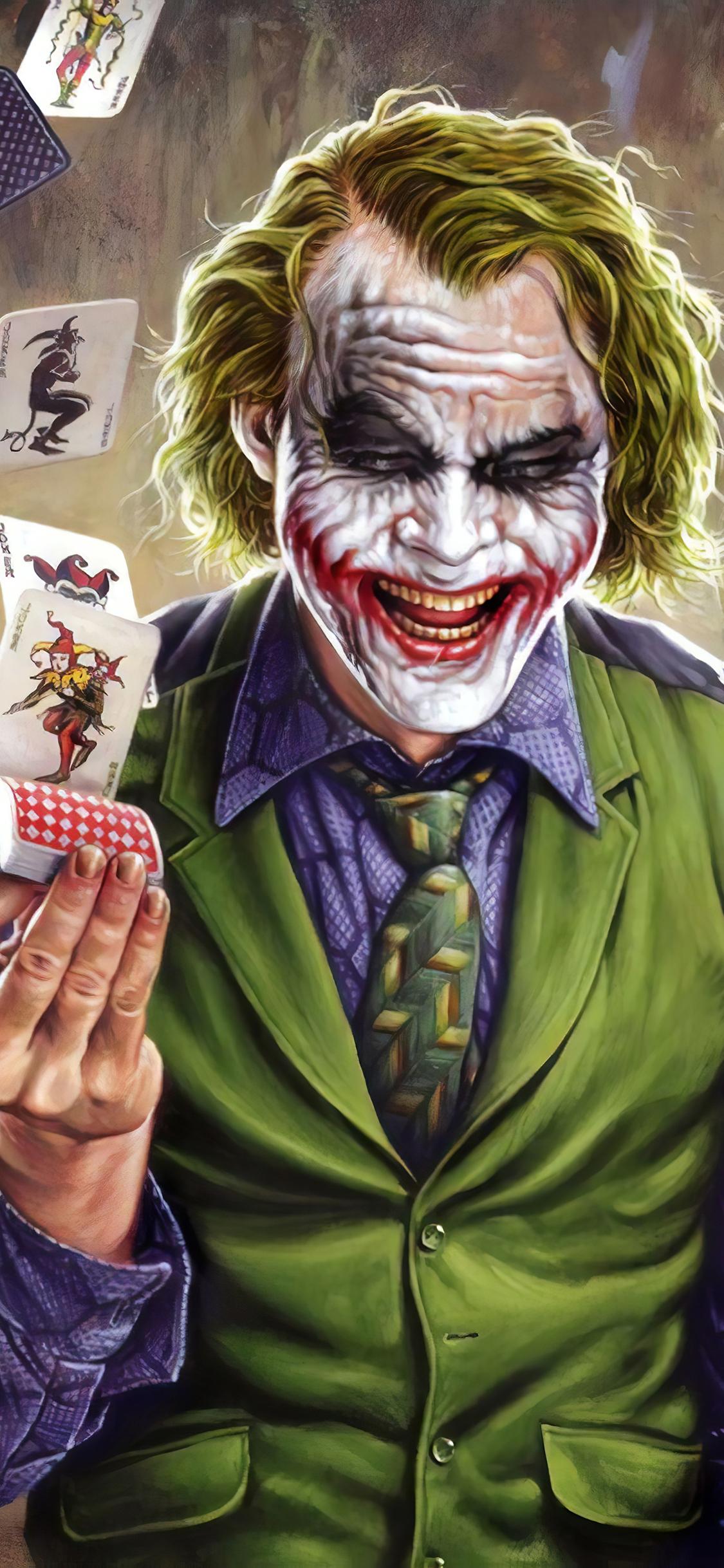 1125x2436 Joker With Card Wallpaper