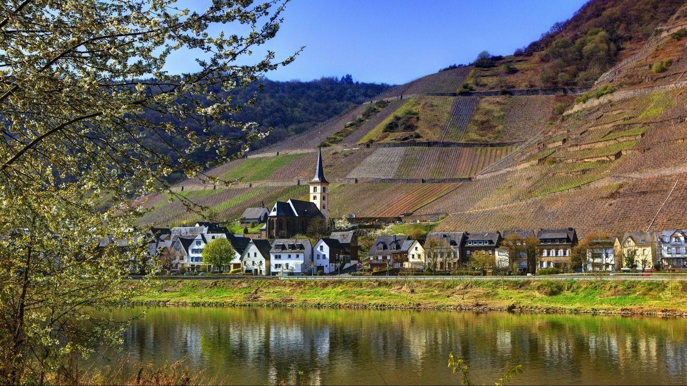 1366x768 Download wallpaper 1366x768 germany, hamburg, mountains, nature