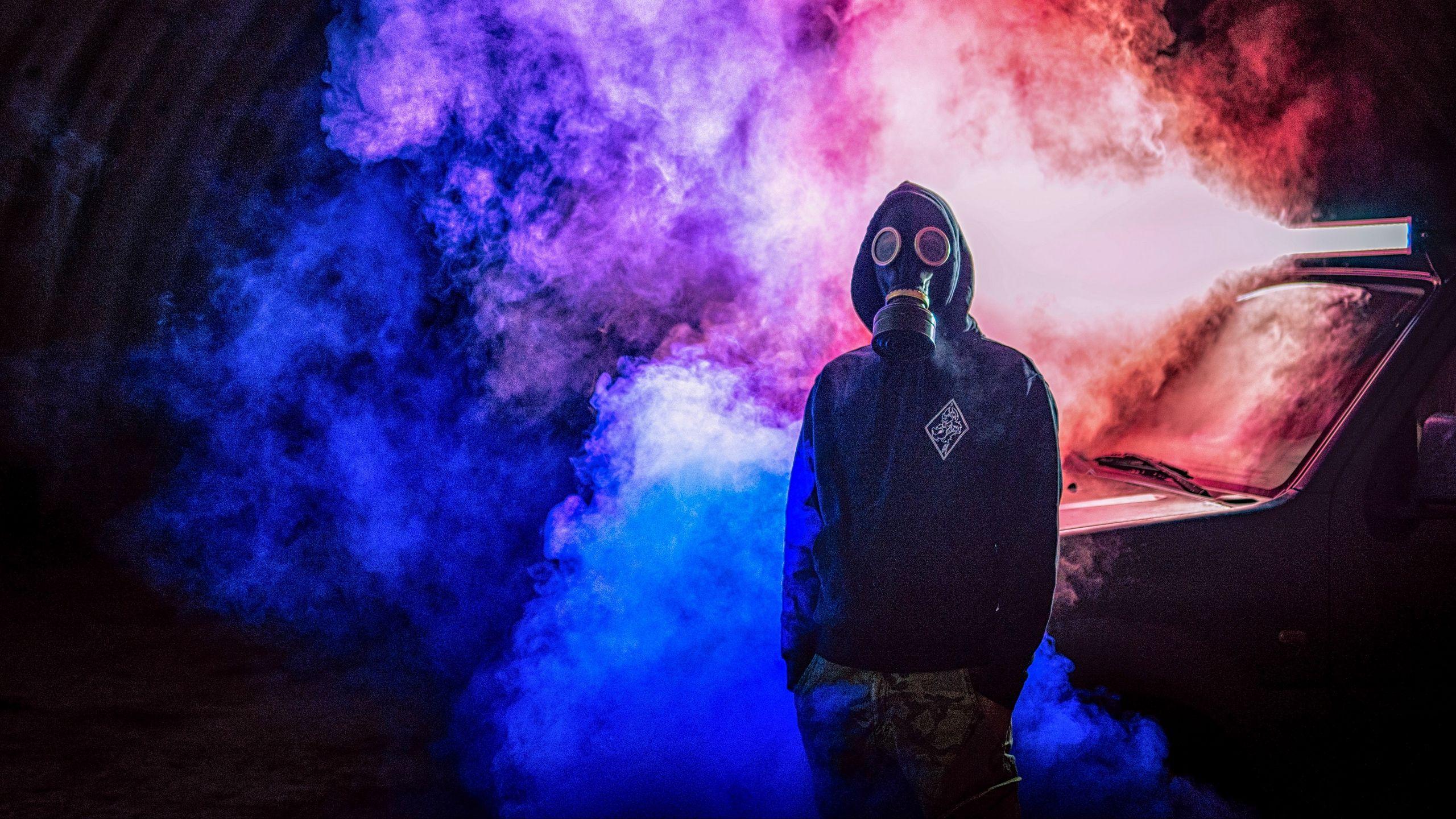 2560x1440 Download wallpaper 2560x1440 gas mask, man, smoke, colorful widescreen 16:9 HD background