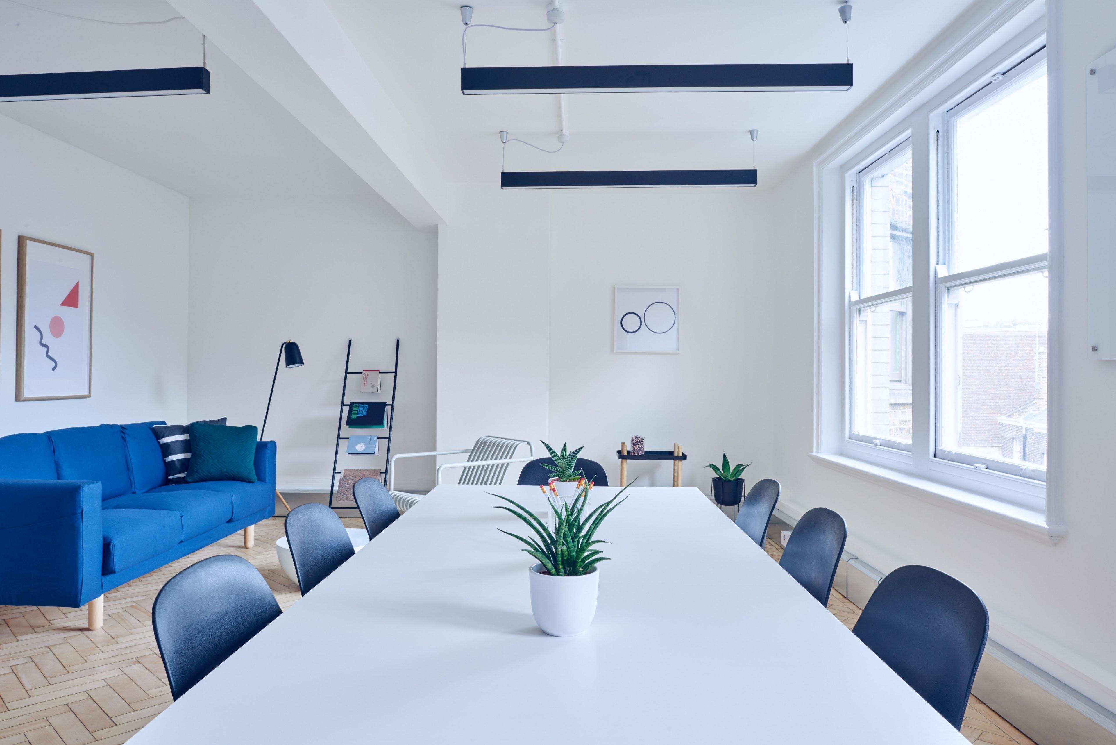 3840x2563 Wallpaper / a minimalist interior with a long white table and a blue sofa, white minimal interior 4k wallpaper free download
