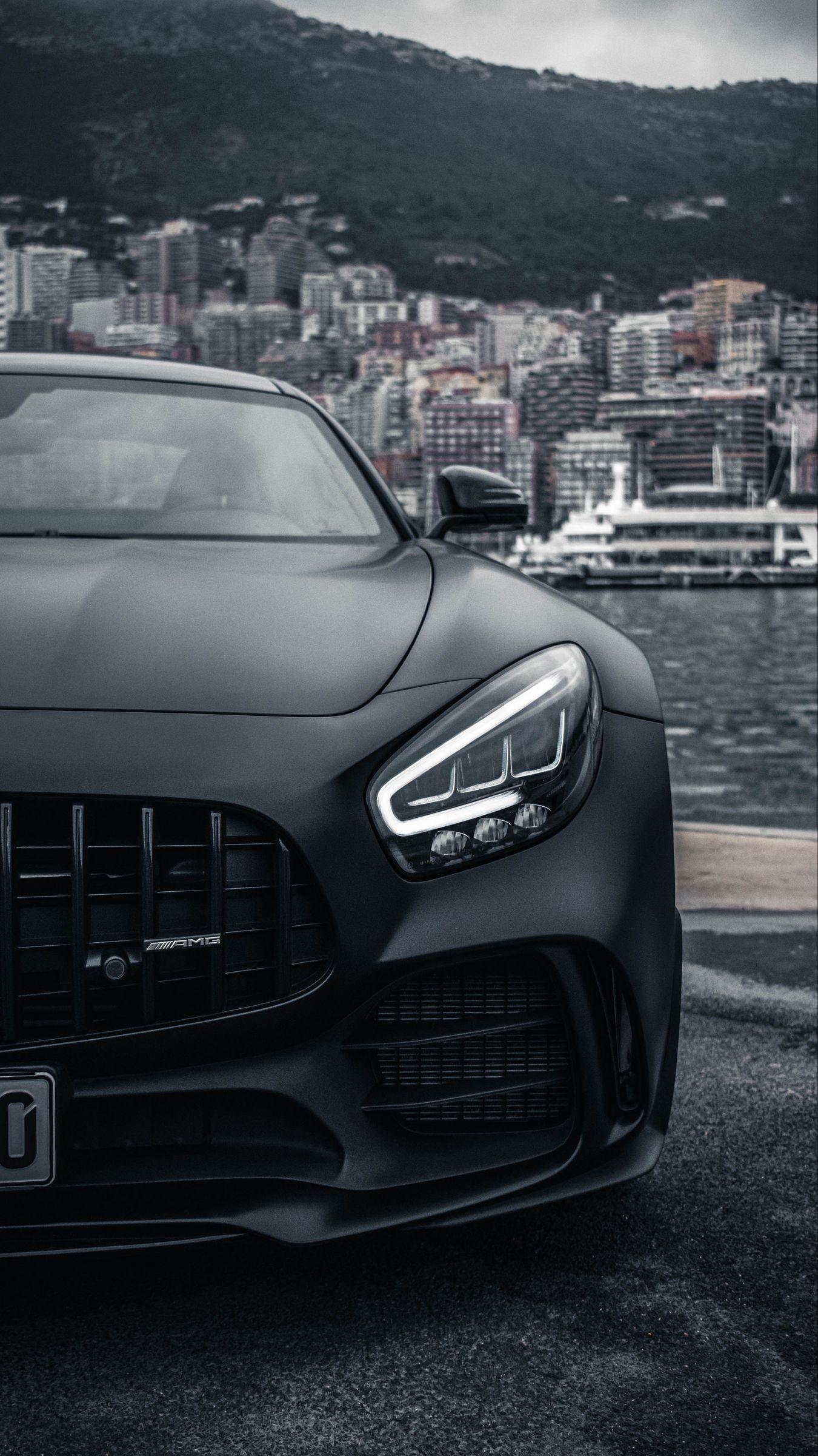 1350x2400 Download wallpaper 1350x2400 sports car, car, front view, black, city iphone 8+/7+/6s+/for parallax HD background
