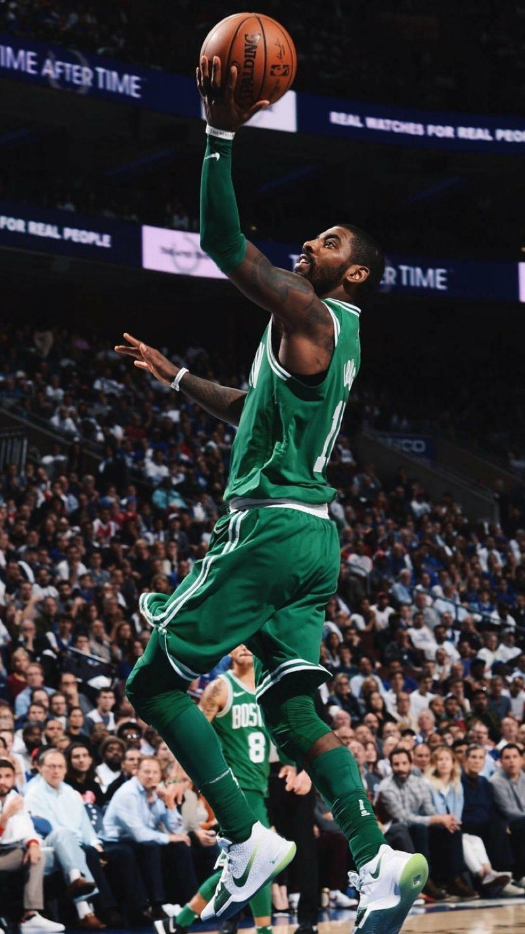 1080x1920 Kyrie Irving Lay Up Shoot Wallpaper
