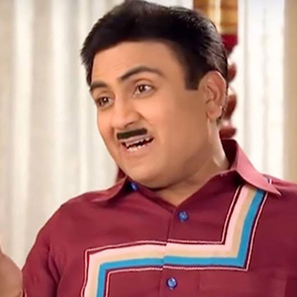 1000x1000 Download Indian Actor Jethalal Champaklal Gada In Maroon Polo Wallpaper