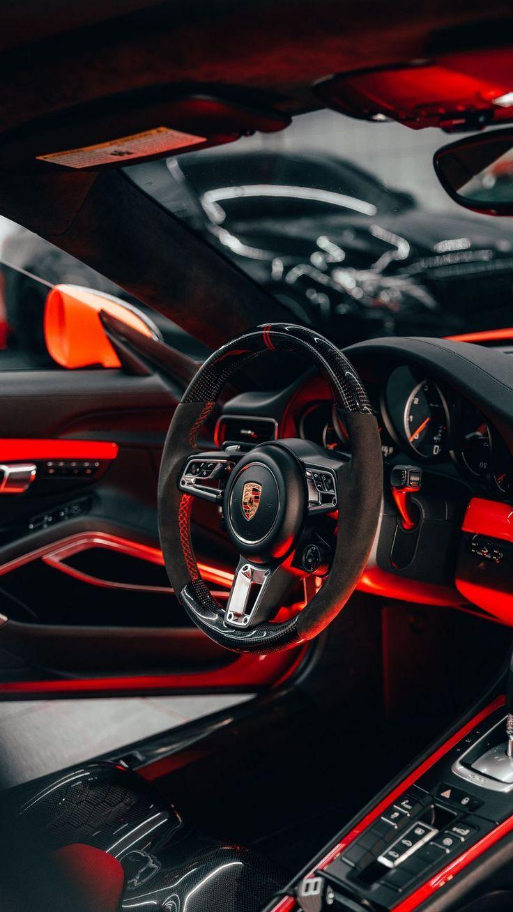 736x1308 Porsche Steering Wheel Decor Background Wallpaper. Porsche, Car iphone wallpaper, Black car wallpaper